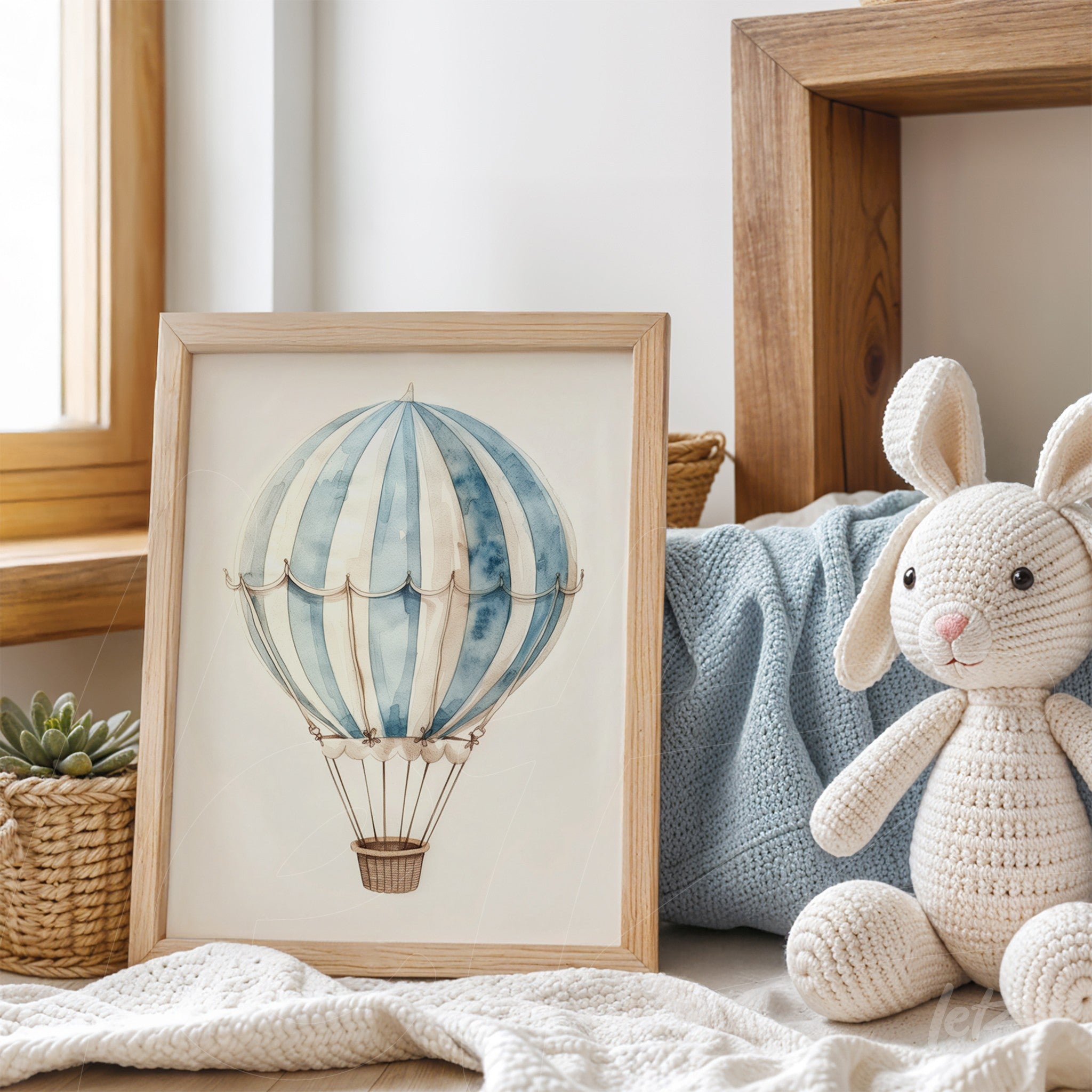 decorative art print of a hot air balloon in light wood frame