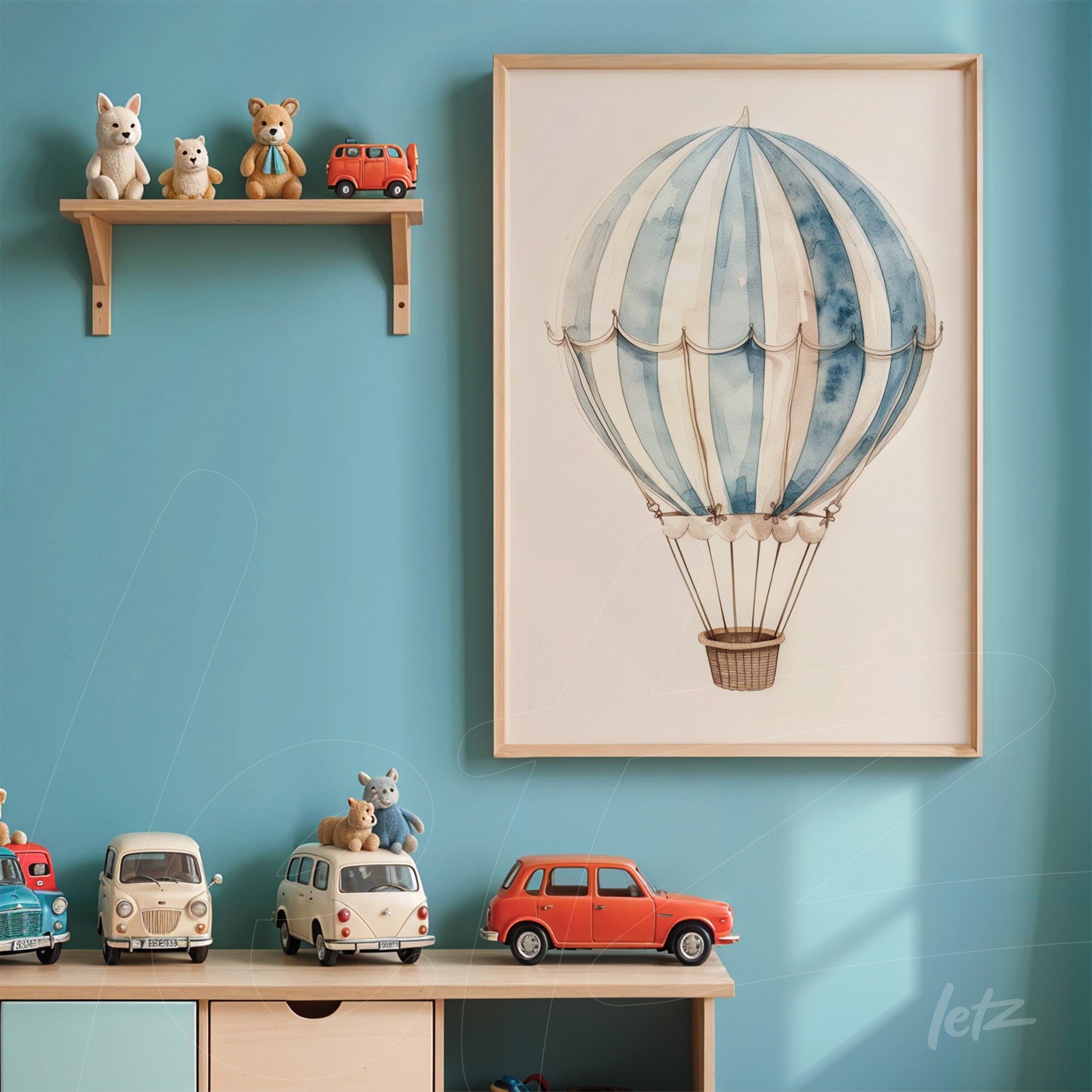framed wall art of a hot air balloon in light frame on blue wall