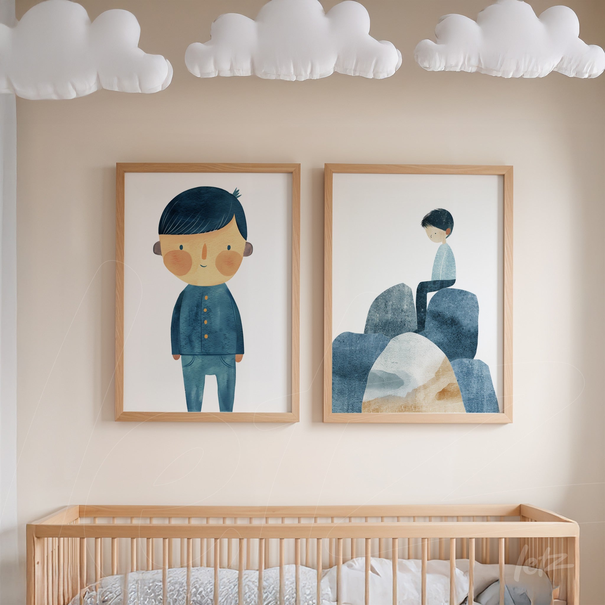 composition of framed children's illustrations featuring a boy in blue and a child sitting on rocks, light wood frame displayed in a nursery setting with decorative clouds on the ceiling