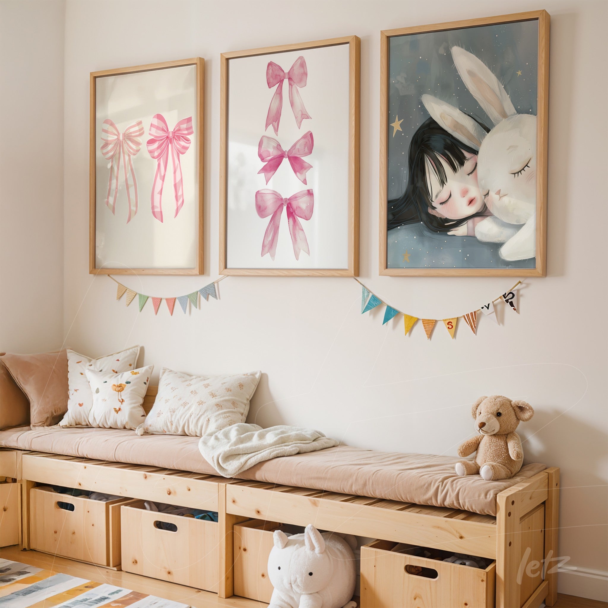 framed artwork composition with soft illustrations including pink bows and a girl with a bunny, arranged above a light wood bench in a children's room