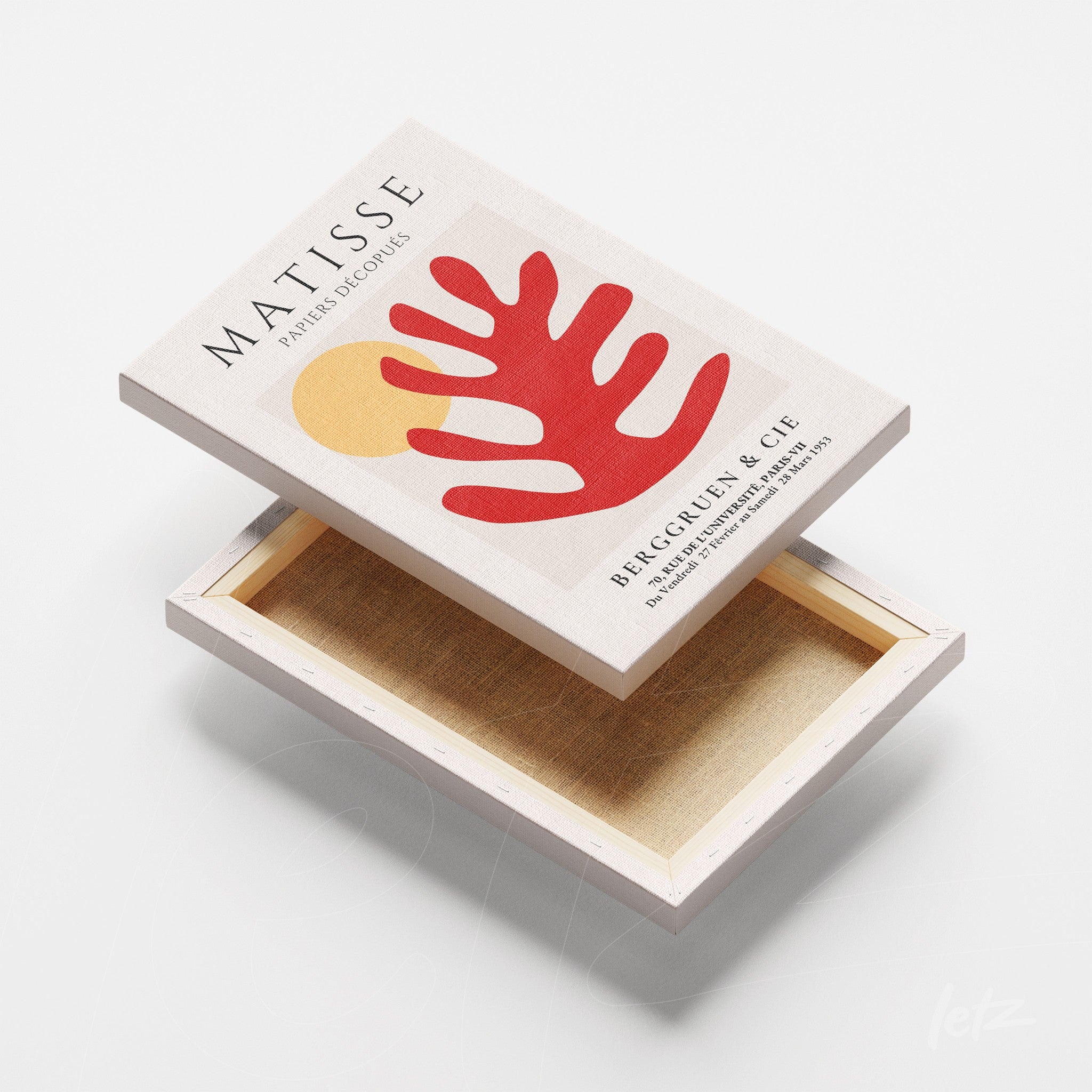 canvas art featuring a modern design of a red leaf and yellow circle on a light background