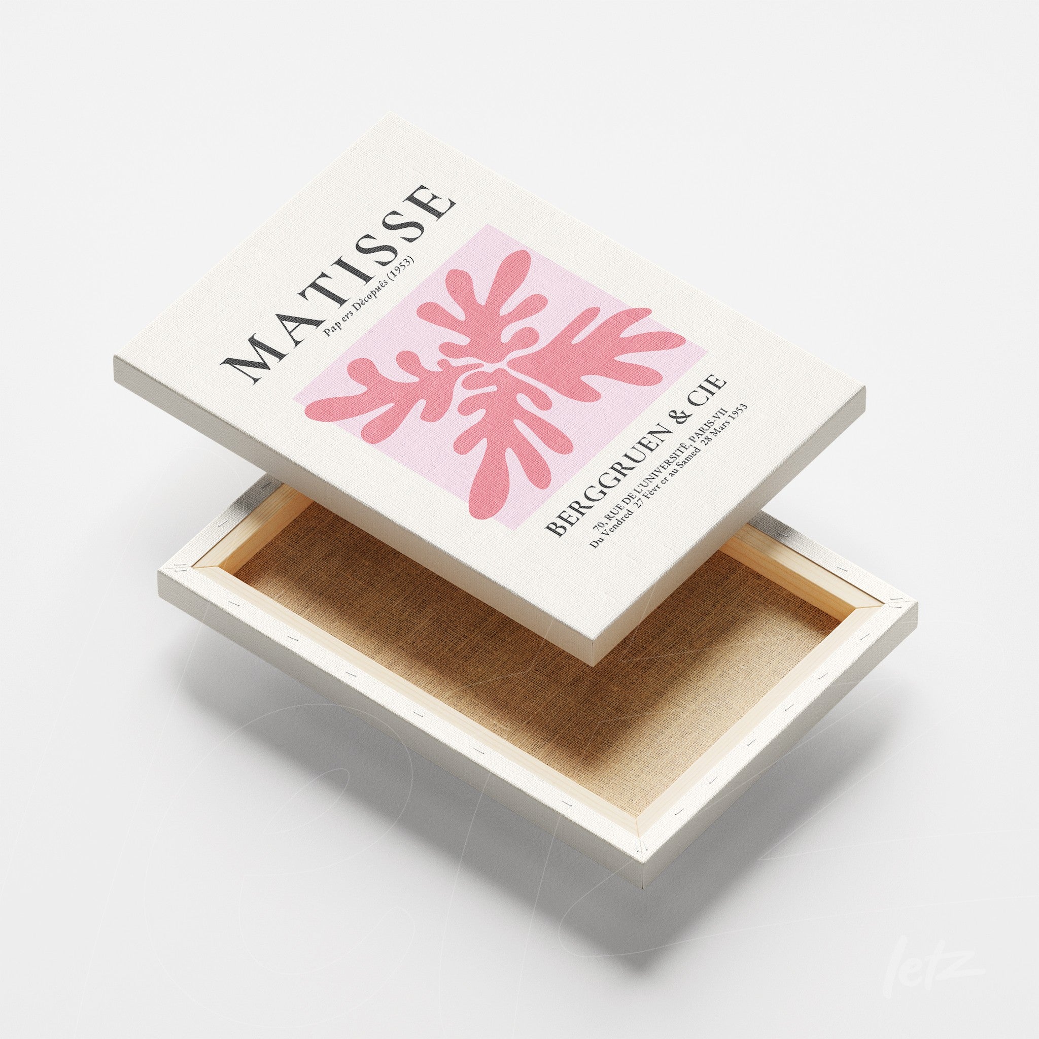 canvas art featuring Matisse's abstract design in pink shapes against a white background displayed at an angle