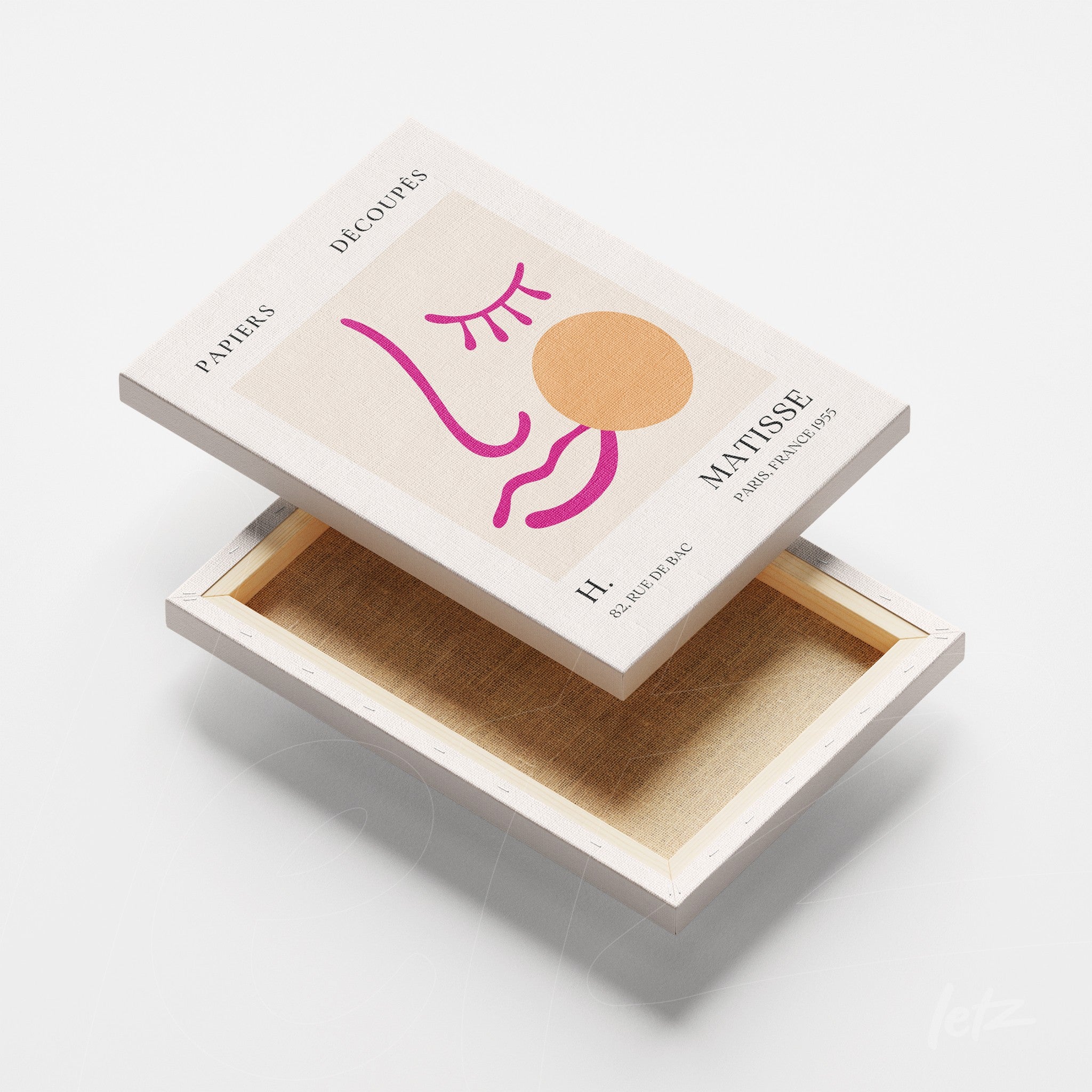 decorative box featuring minimalist artistic design with stylized faces in pink and orange on light background