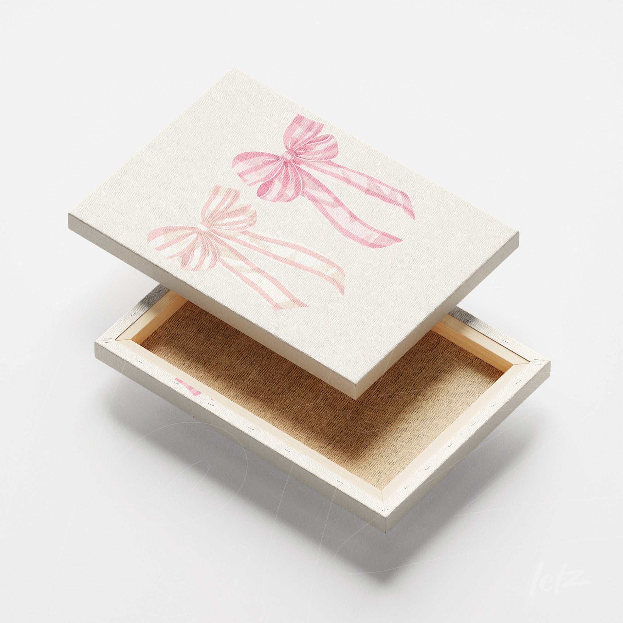 canvas art featuring pink ribbon illustrations on a light background