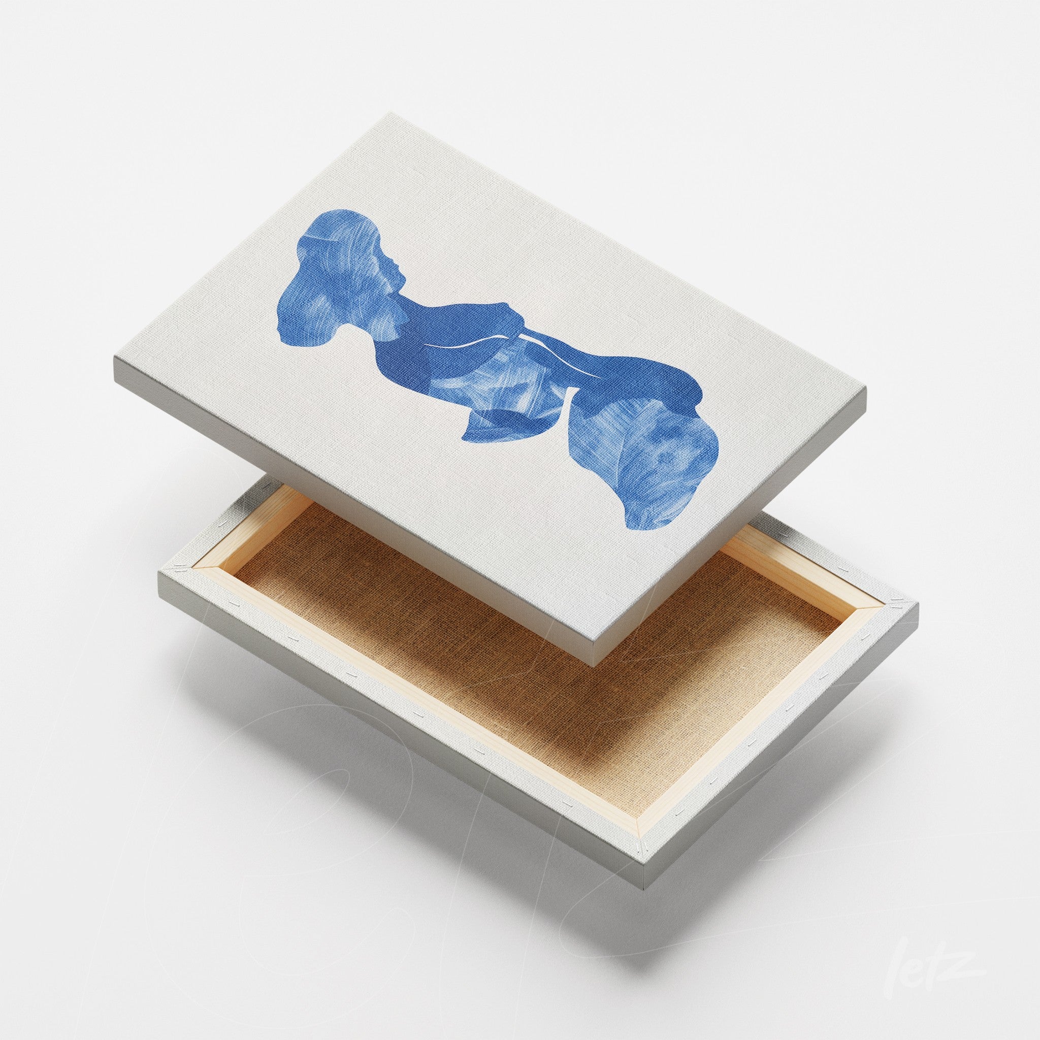 canvas artwork featuring abstract shapes in shades of blue on a light background