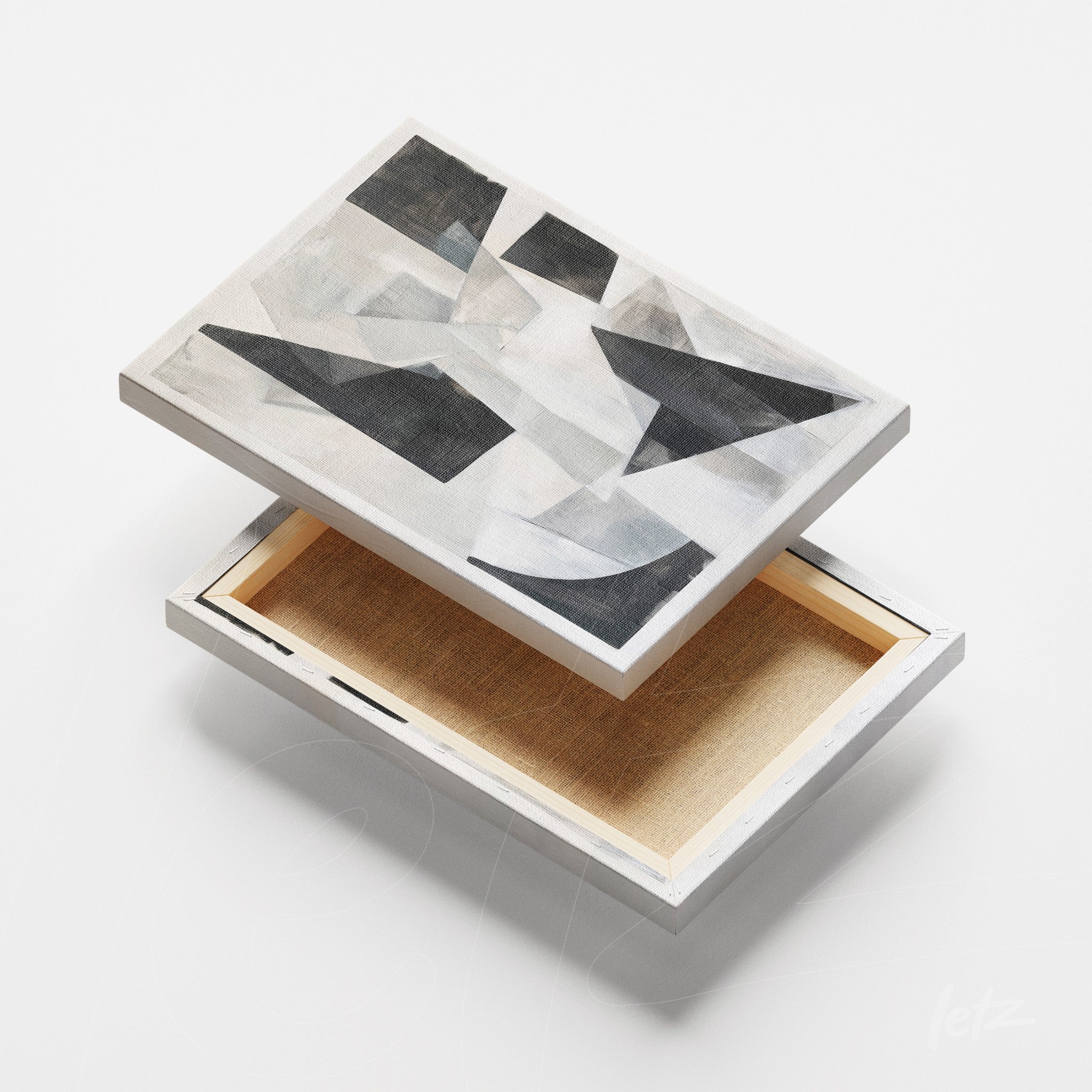 canvas print featuring abstract art in shades of gray and black, white frame with textured background