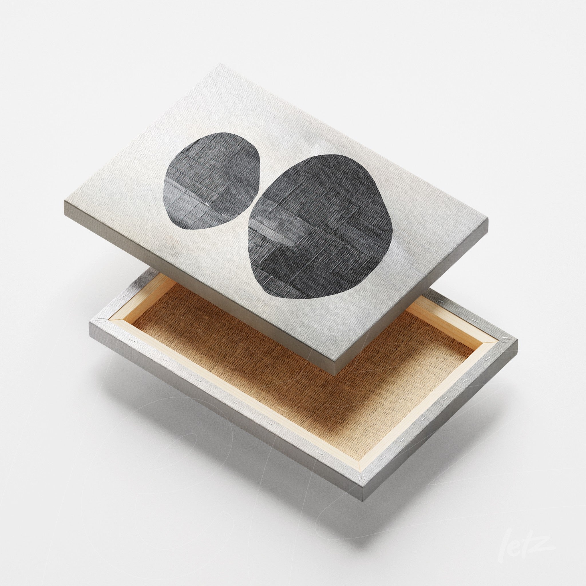 canvas print featuring abstract art in neutral tones, showcasing oval shapes in black on a textured background