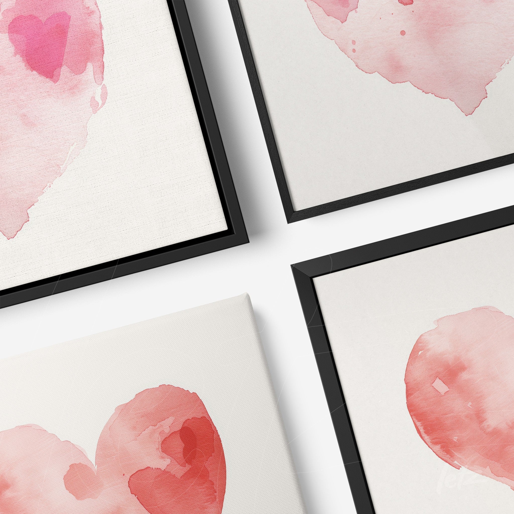 collection of framed wall art featuring pink watercolor hearts with black frames