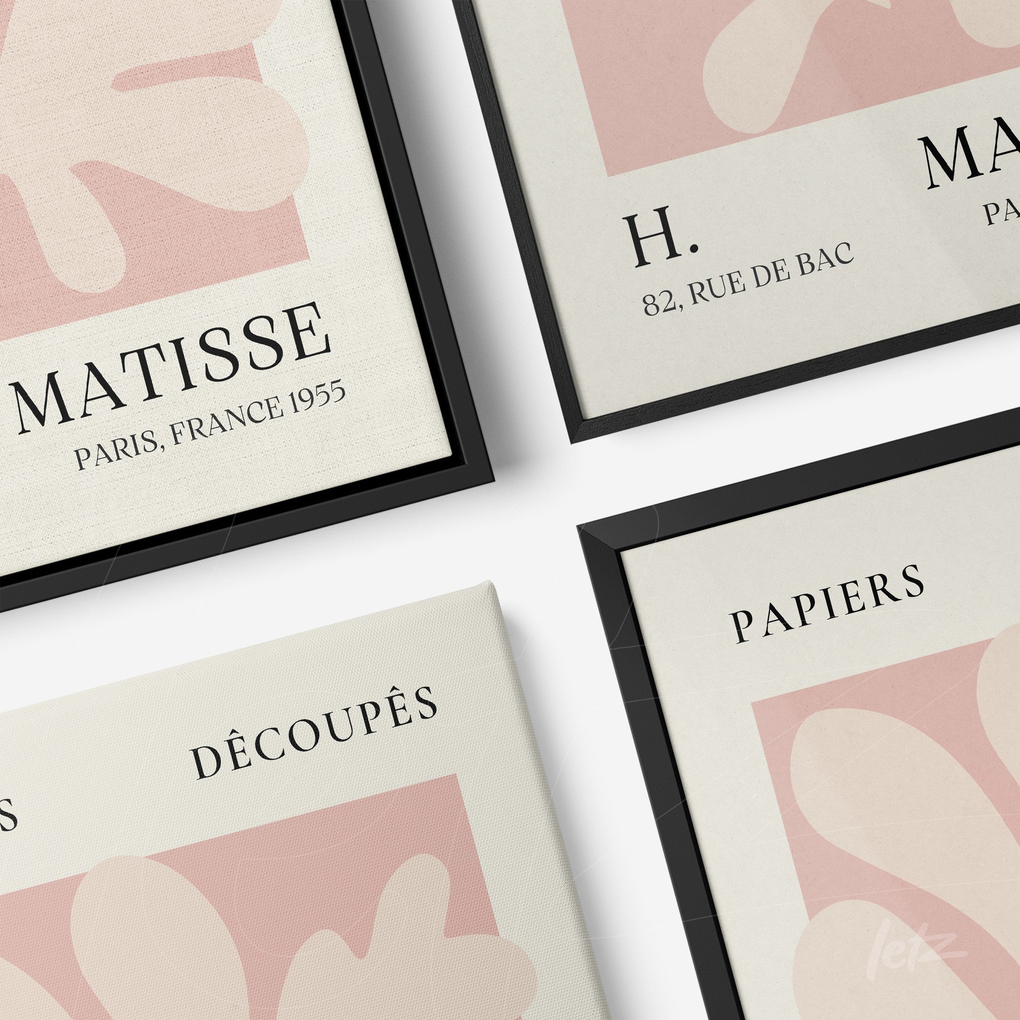 composition of wall art featuring contemporary abstract design in soft colors with black and natural frames