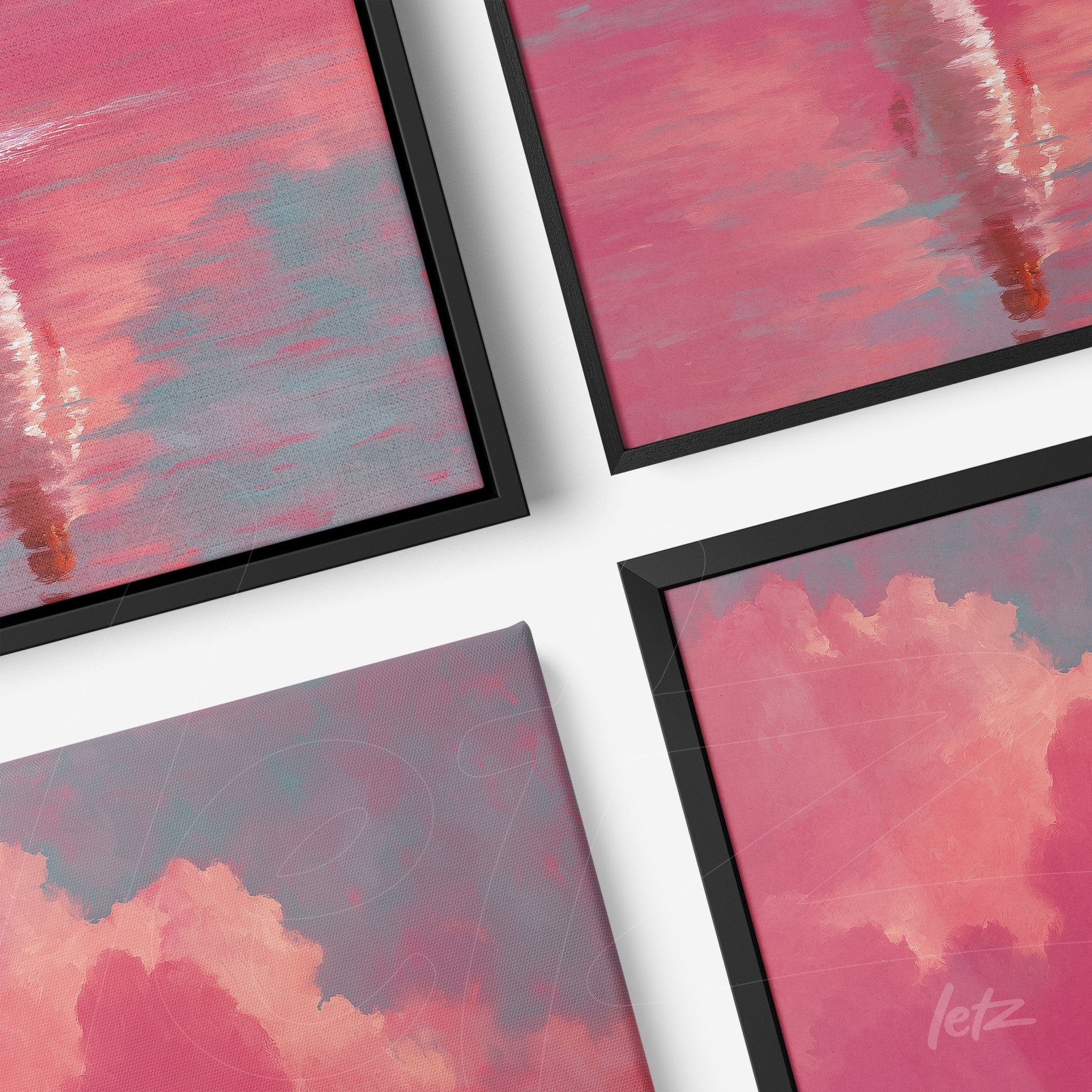 composition of framed abstract art in shades of pink and blue with black frames