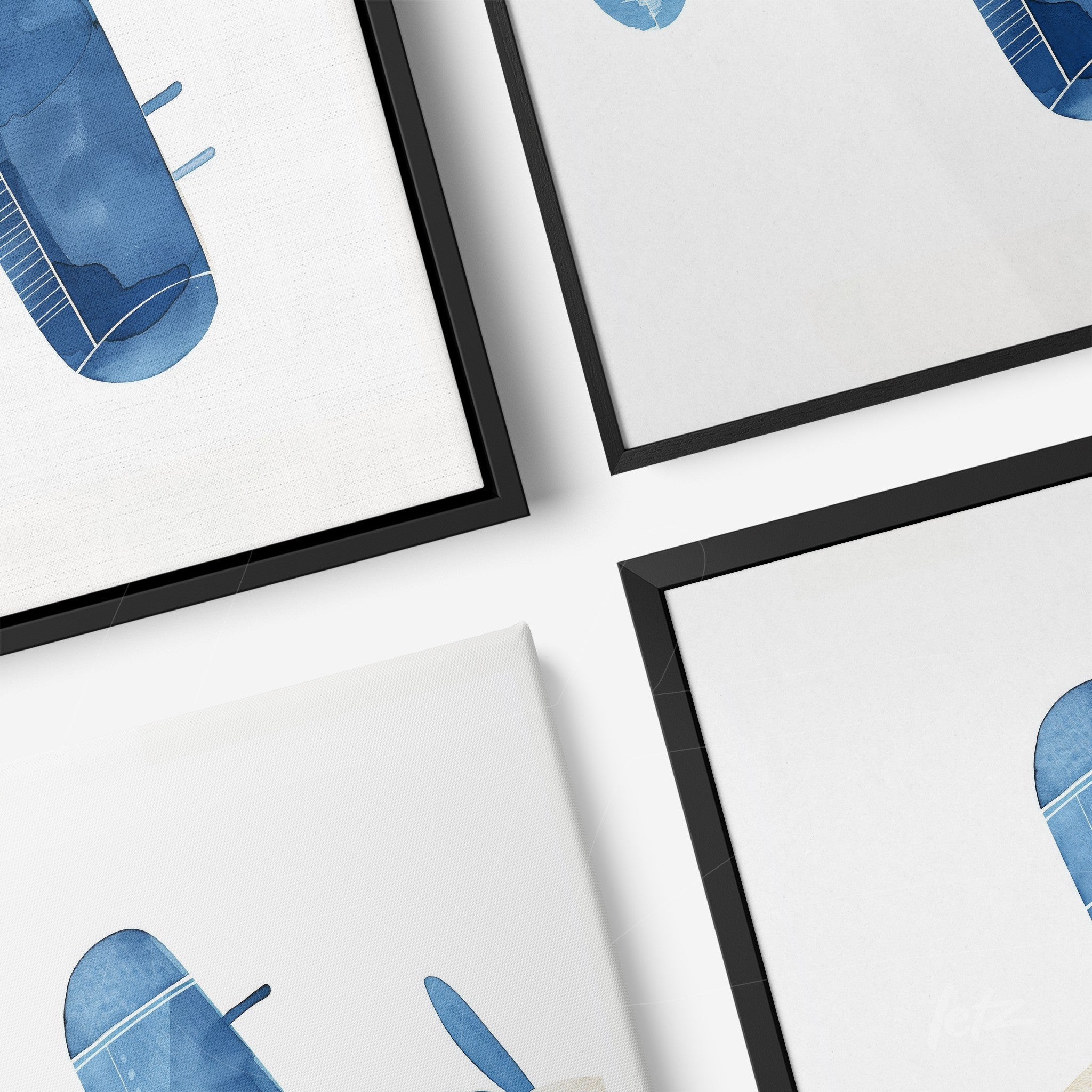 composition of art pieces in different frames featuring abstract illustrations in shades of blue on light background