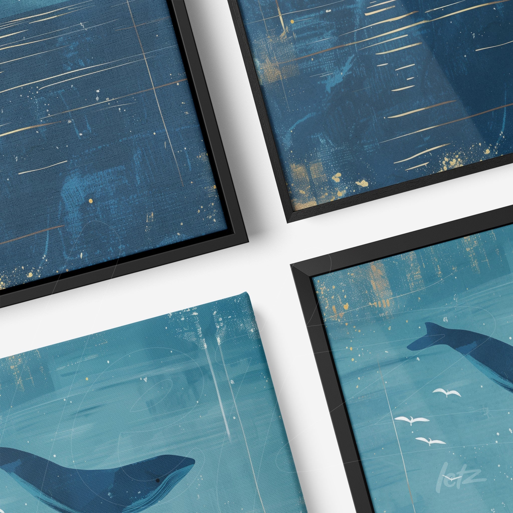 set of framed abstract whale art pieces in shades of blue with black frames
