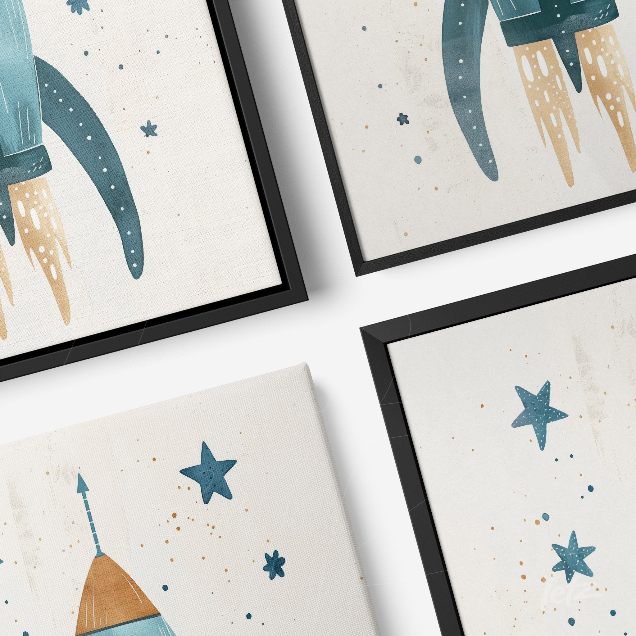 composition of framed wall art featuring rockets and stars against a light background