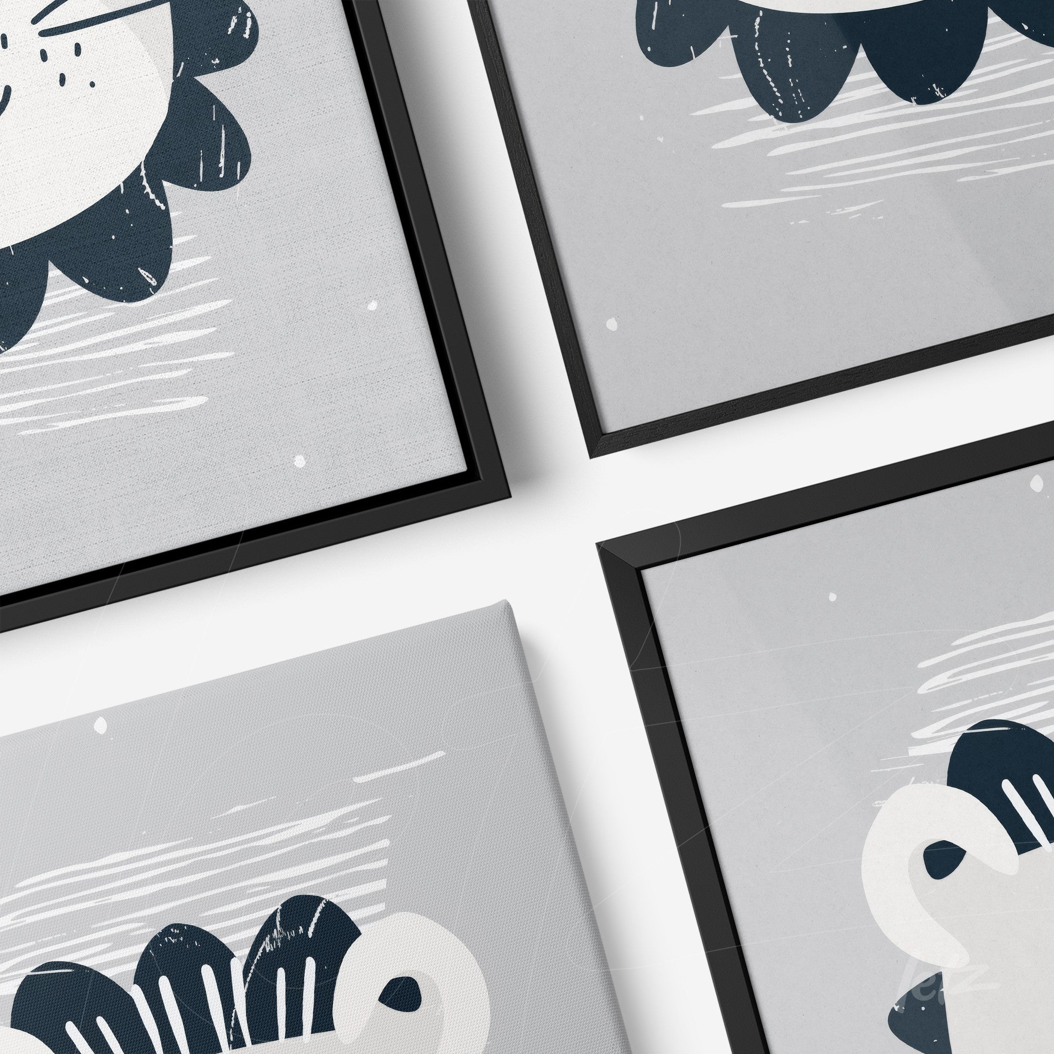 composition of framed wall art featuring modern illustrations of a lion and a flower in black frames