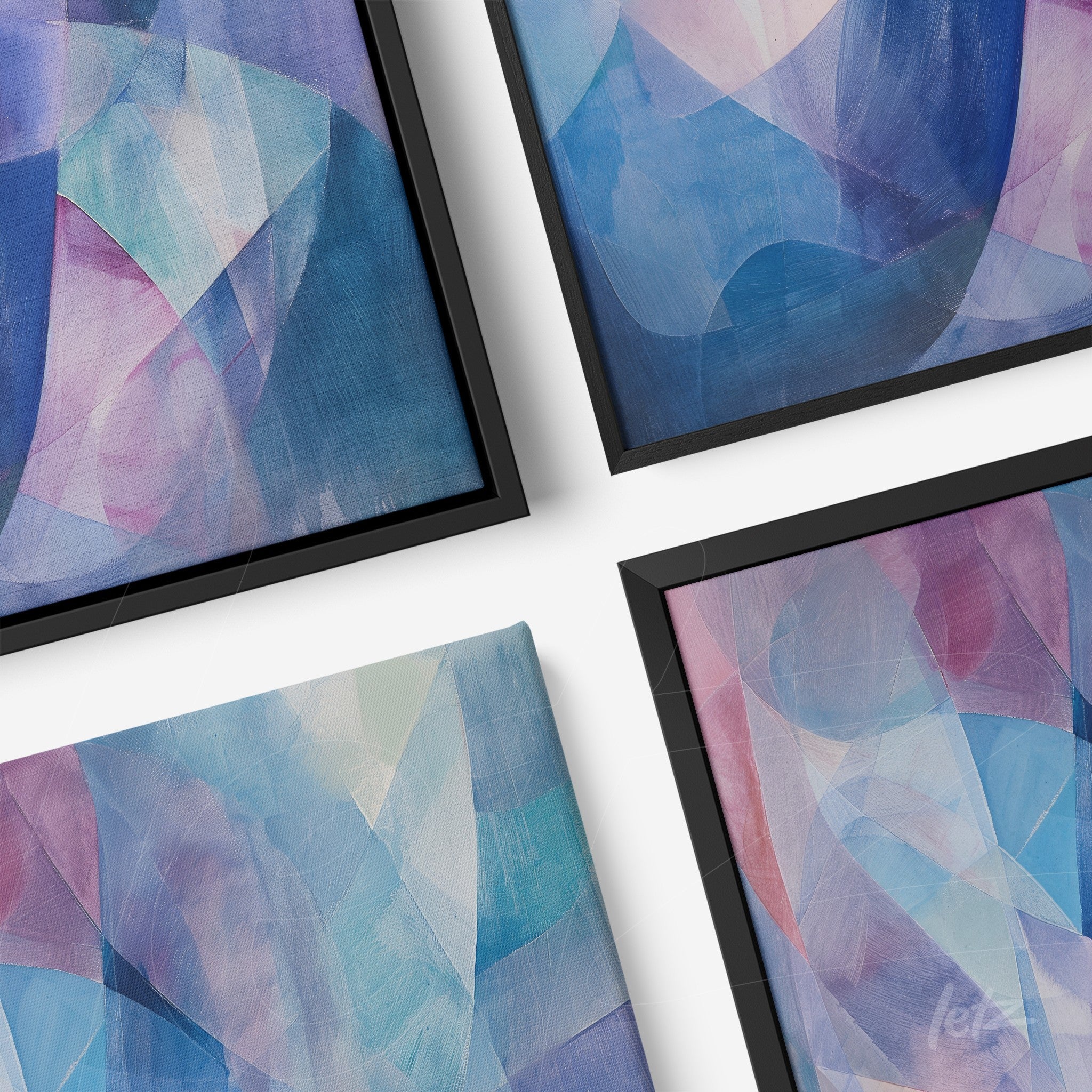 composition of abstract wall art in shades of blue and pink with thin black frames