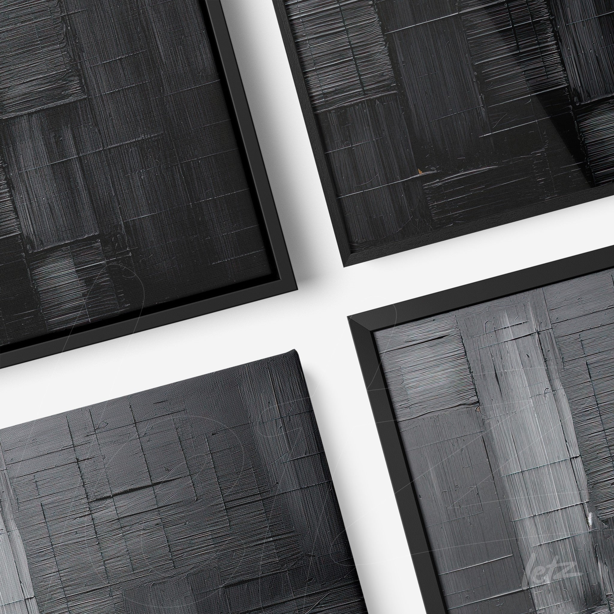 collection of framed wall art featuring abstract textured designs in black and gray, with thin black frames