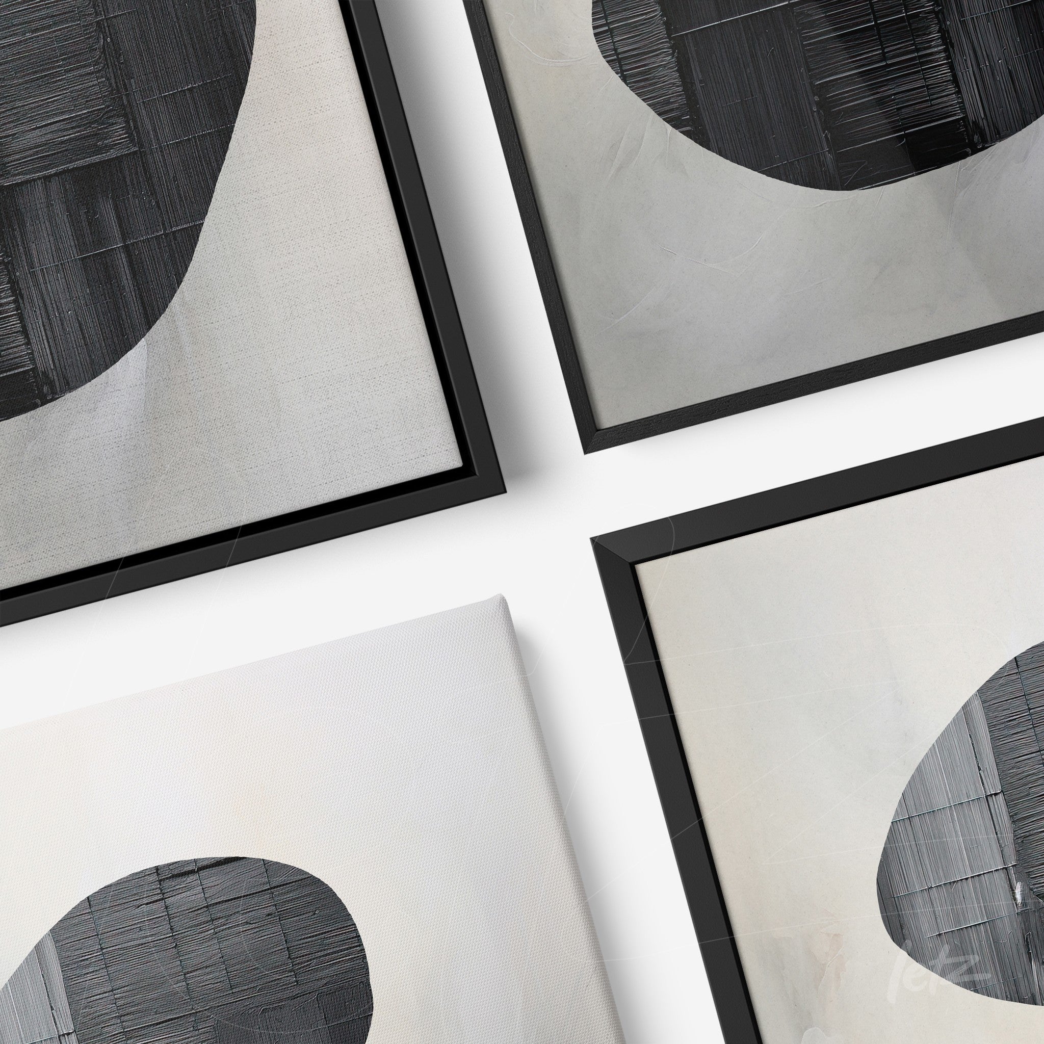 composition of abstract art pieces in black and white with thin dark frames on a white background