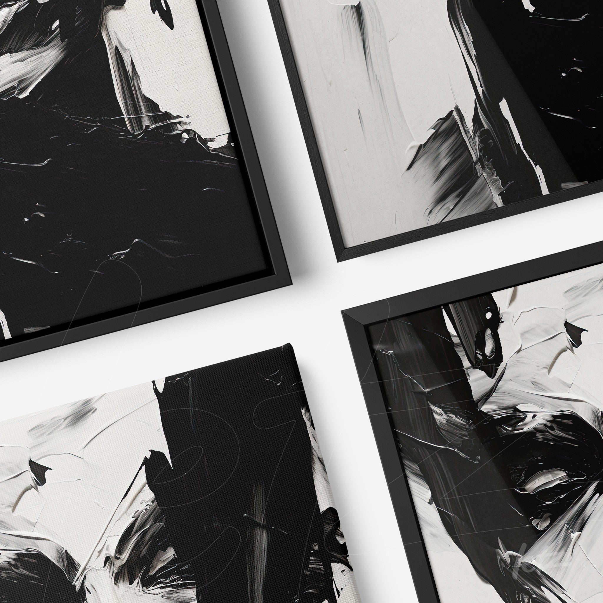 composition of abstract wall art featuring bold black and white brushstrokes in black frame