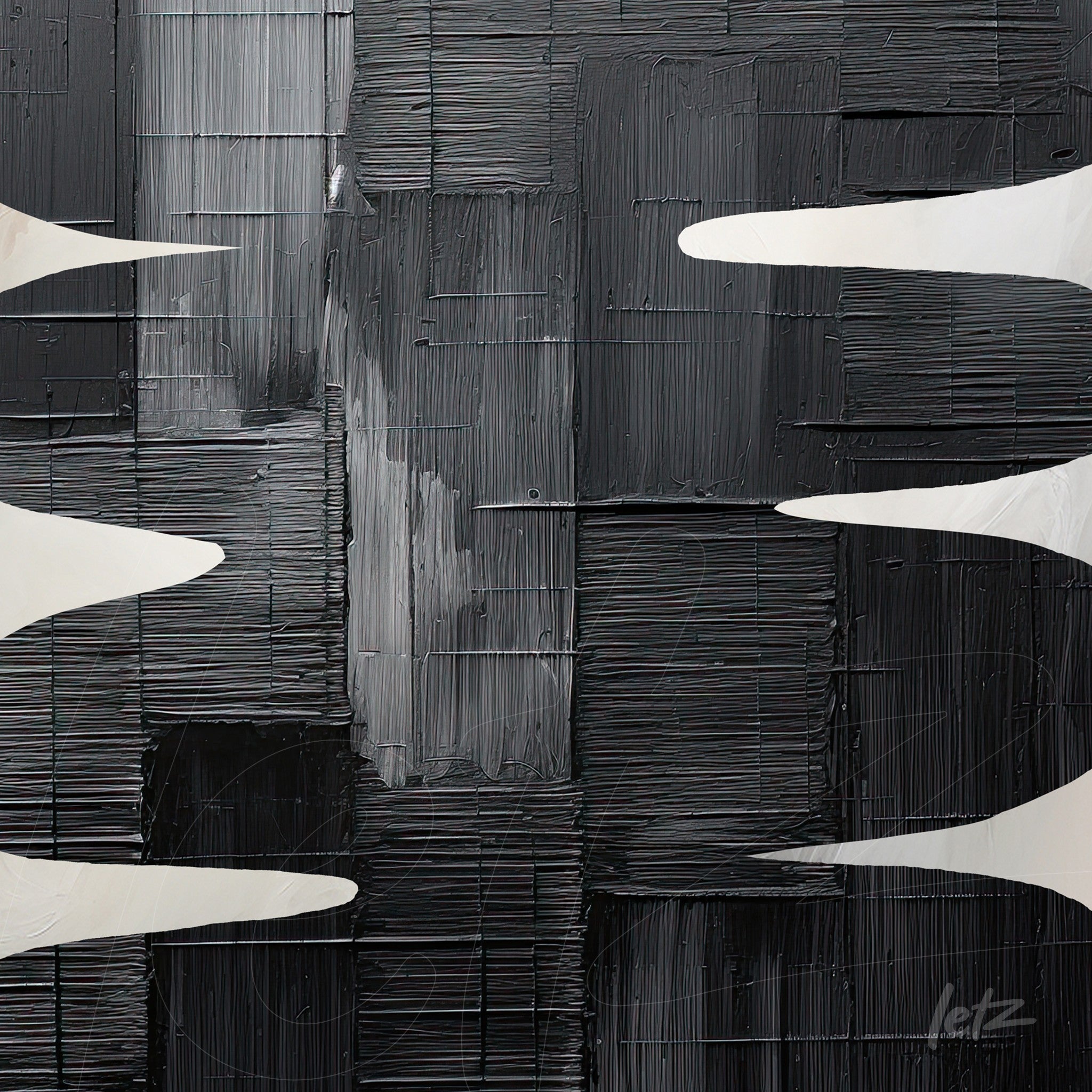 abstract wall art in black and gray tones featuring flowing white shapes
