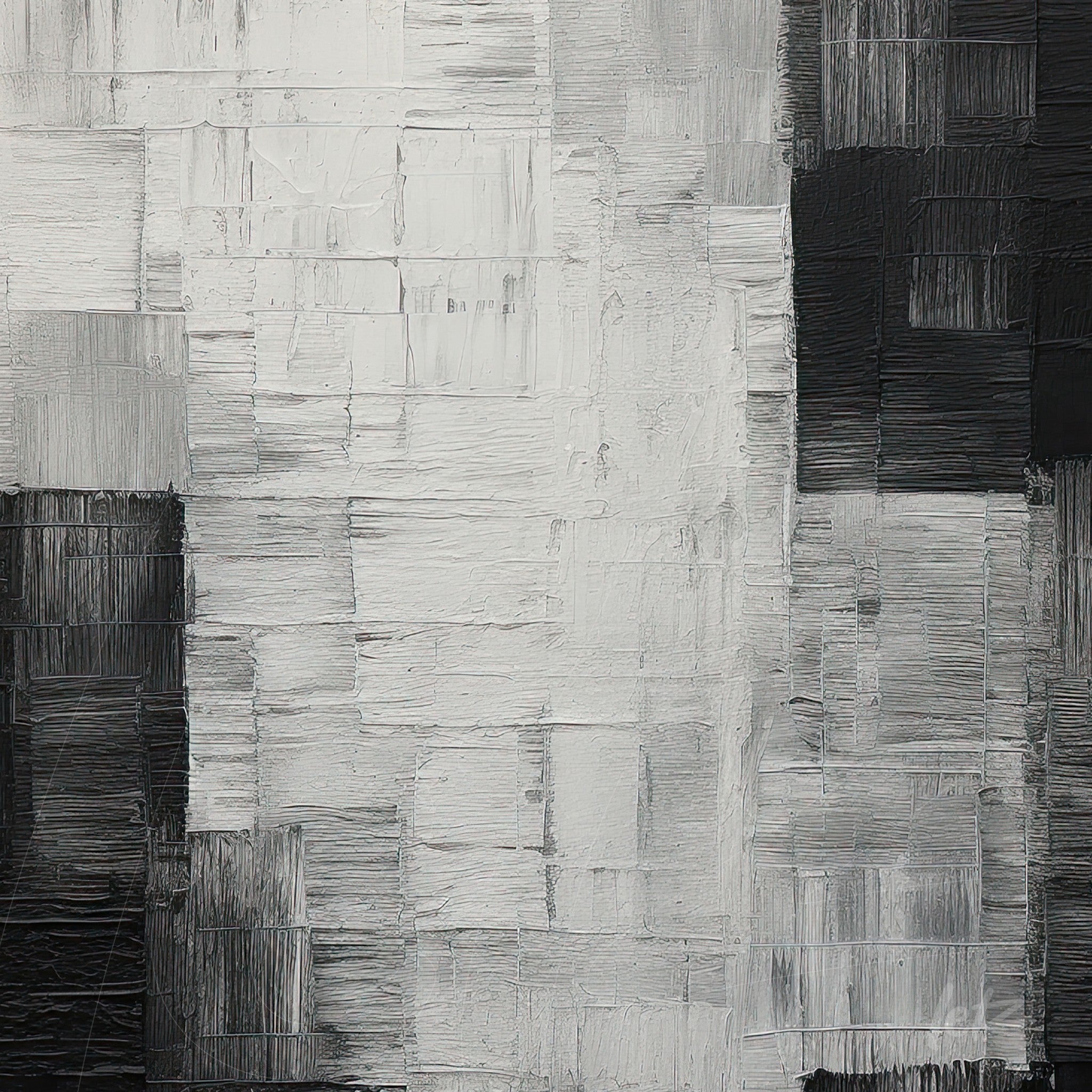 abstract wall art in shades of black, white, and gray showcasing rich texture and rectangular shapes