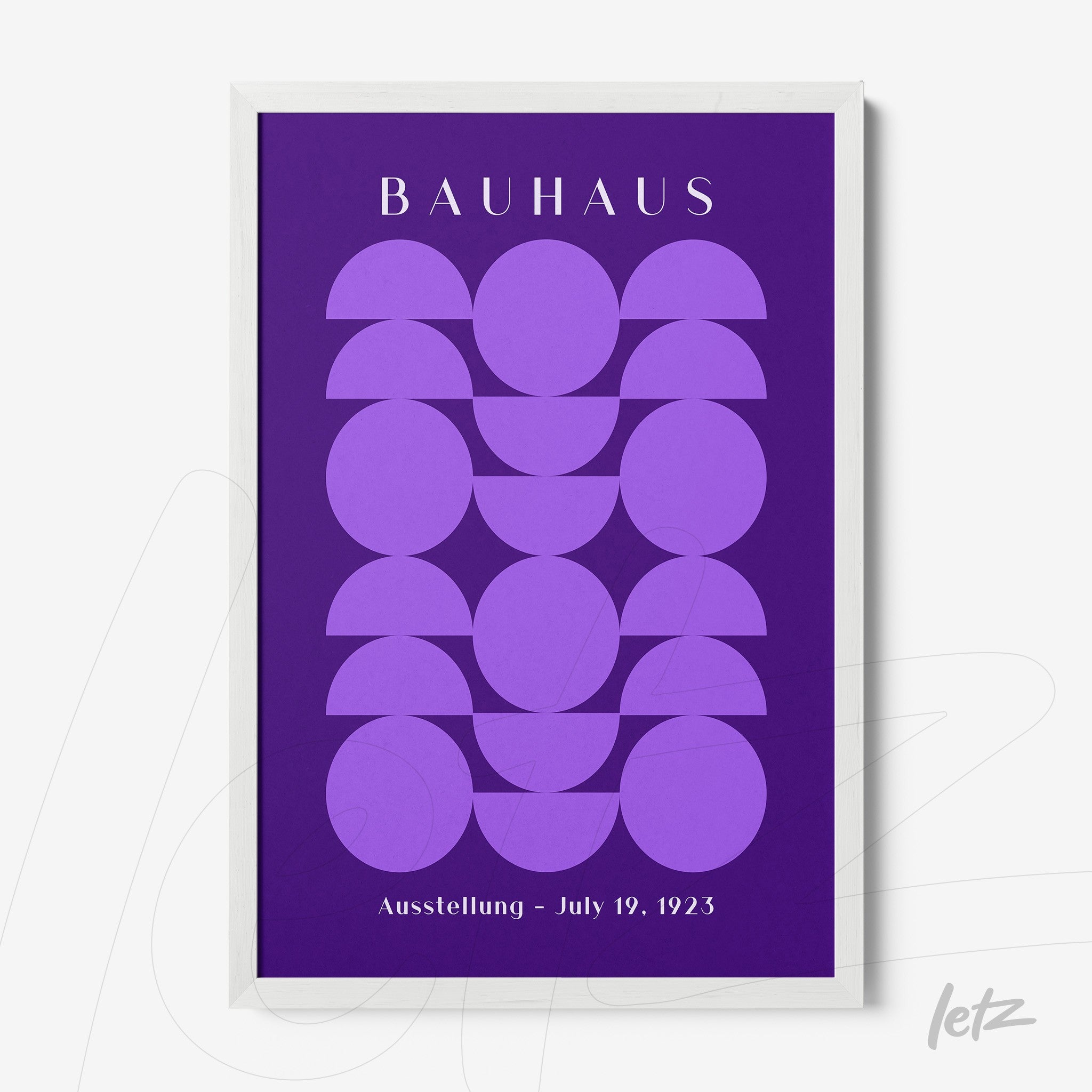 poster print with geometric design in purple featuring text 'bauhaus' and 'ausstellung - july 19, 1923' in a white frame