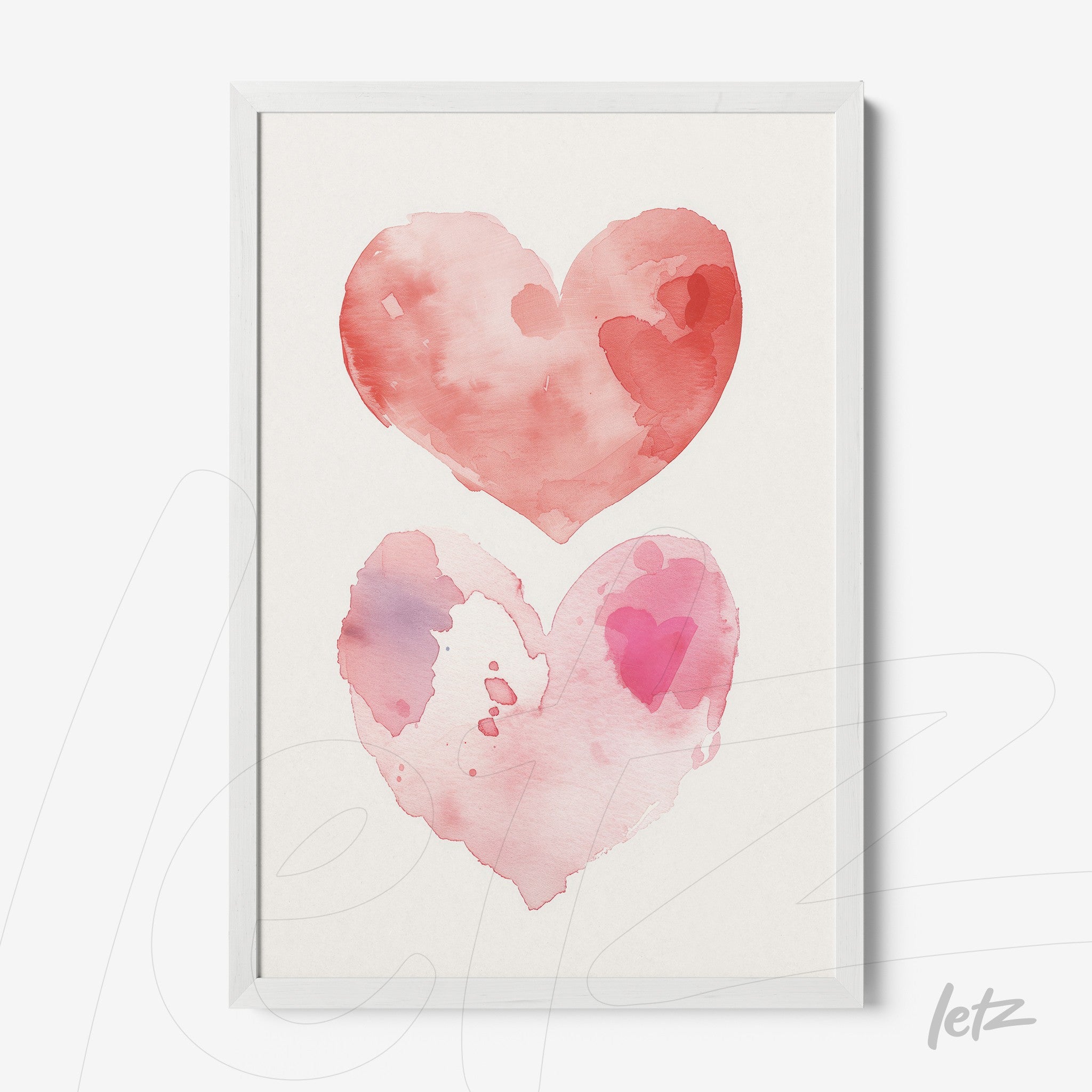 framed watercolor art of two hearts in shades of pink with a white frame