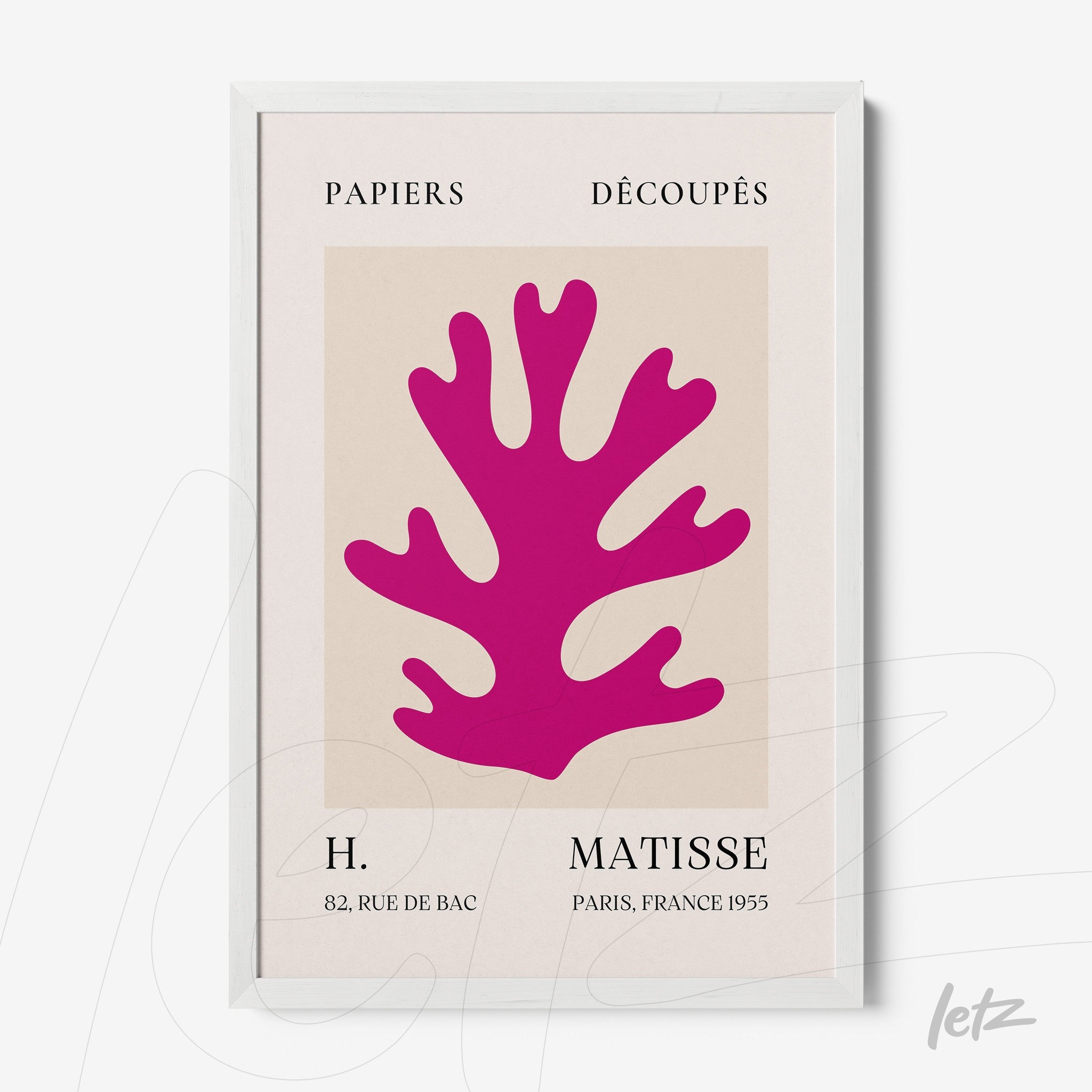 framed modern art depicting a pink coral shape on a light background with white frame