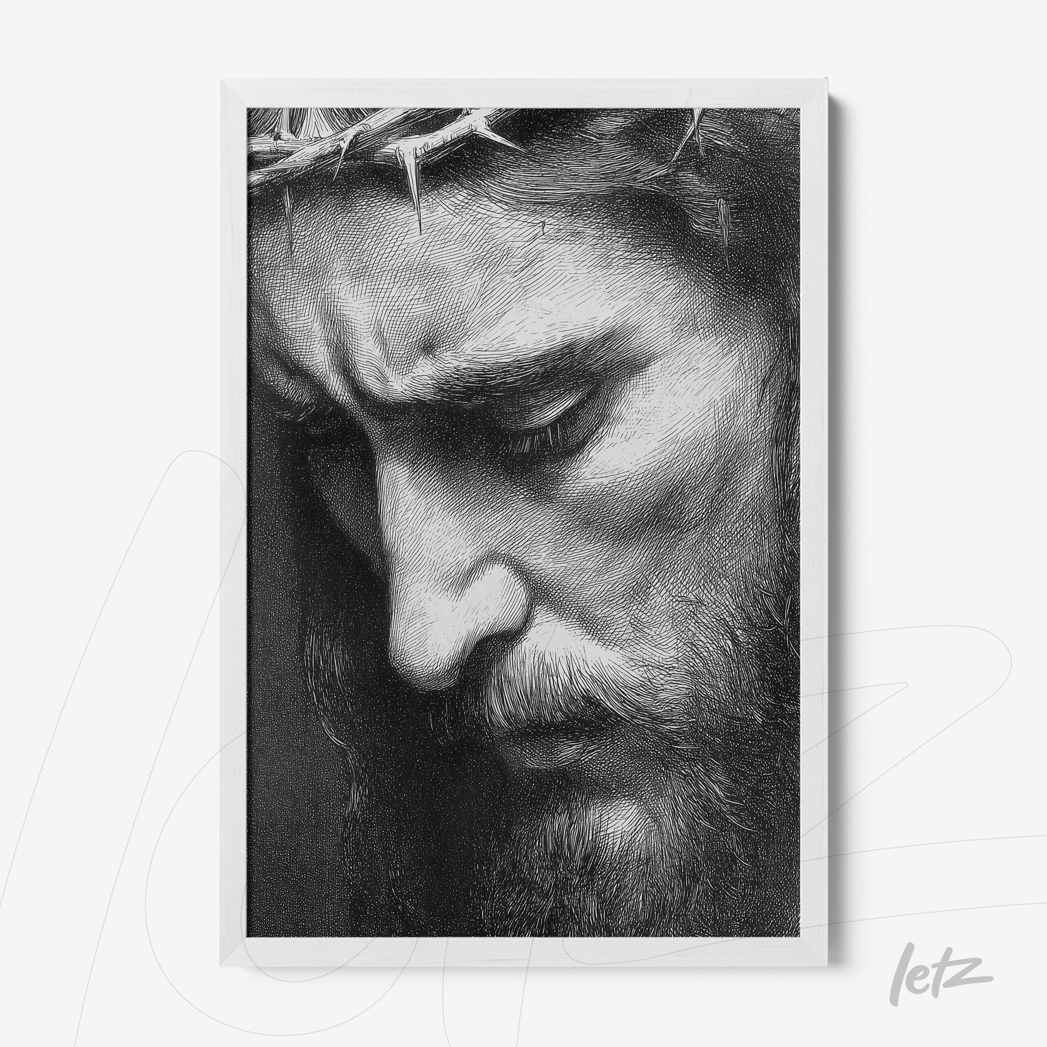framed artwork featuring a black and white portrait of a male figure with a sorrowful expression