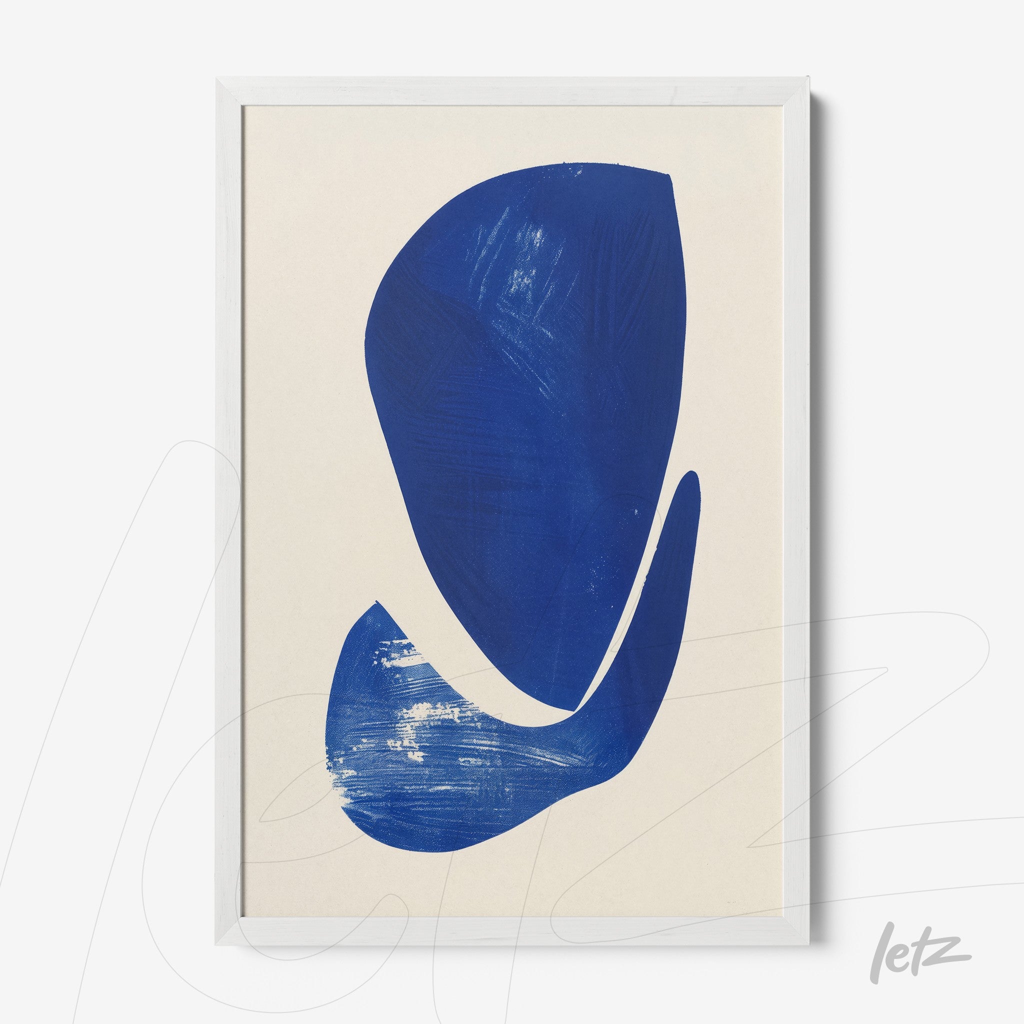 framed abstract art in deep blue on light background with white frame