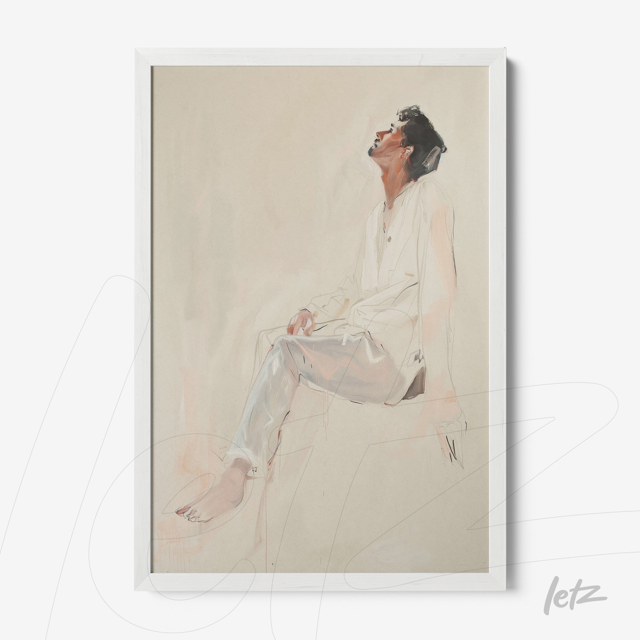 artistic portrait of a sitting man in a contemplative pose with white frame