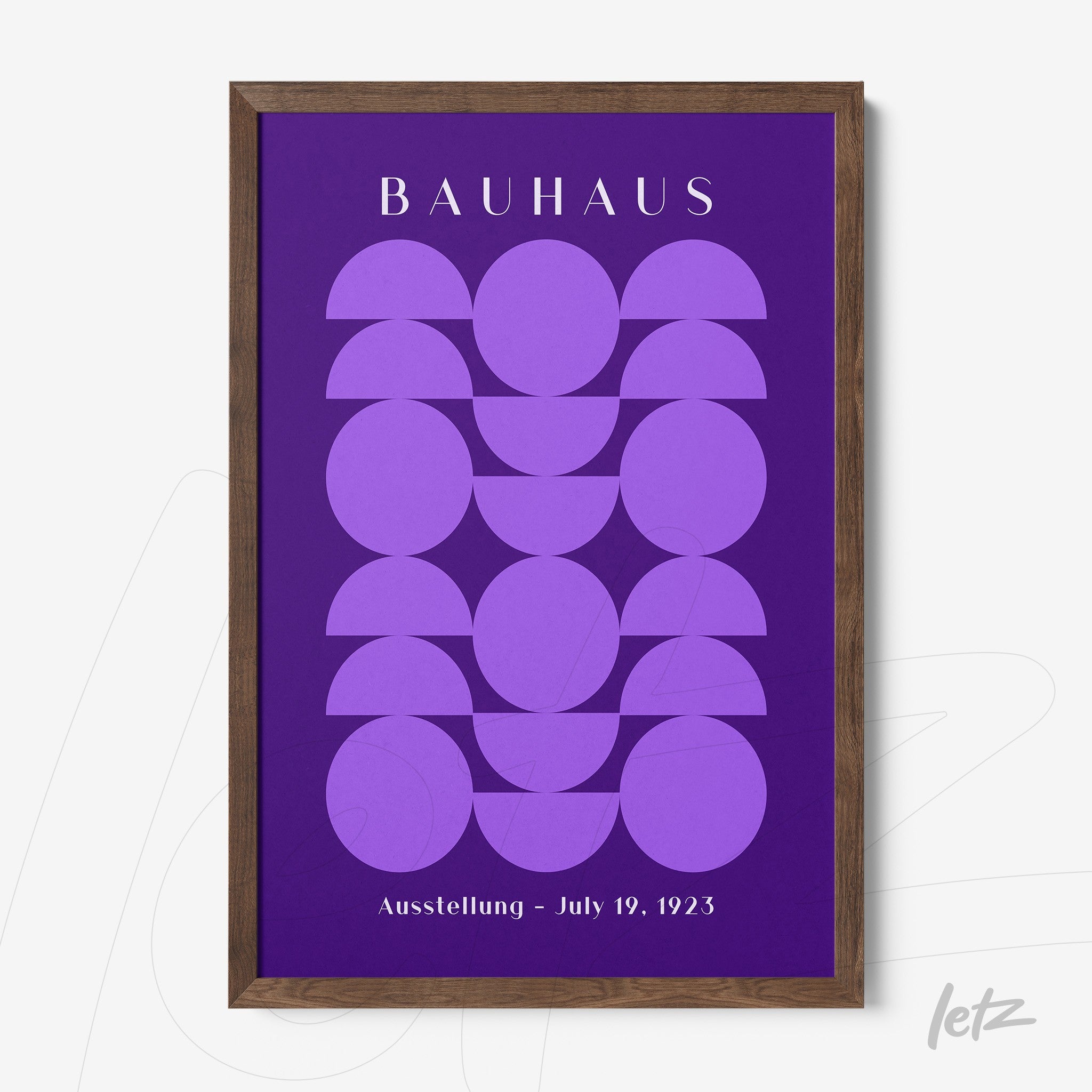 poster print with purple Bauhaus-style geometric art in dark wood frame