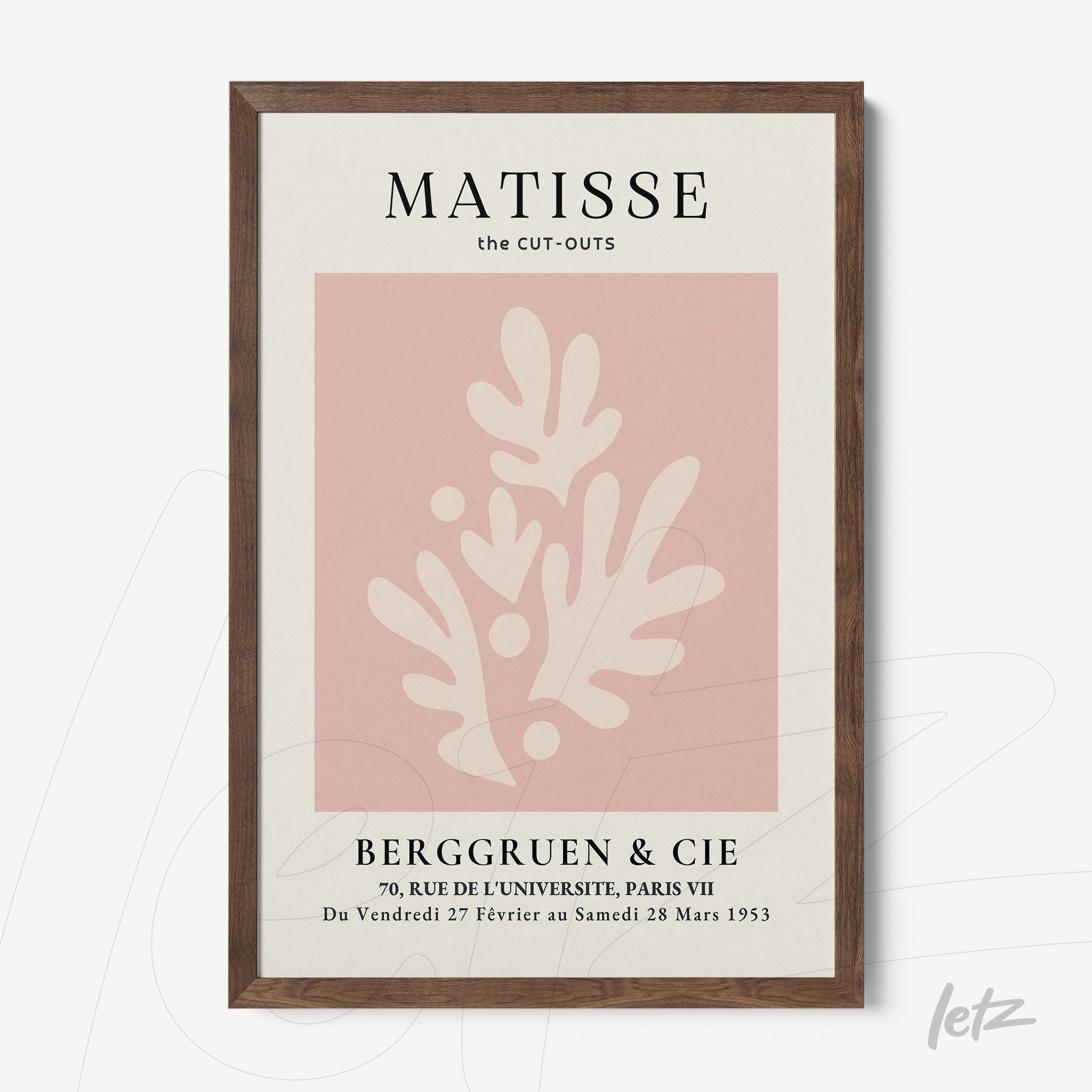 framed artwork inspired by Matisse featuring abstract organic shapes on a pink background with a dark wood frame
