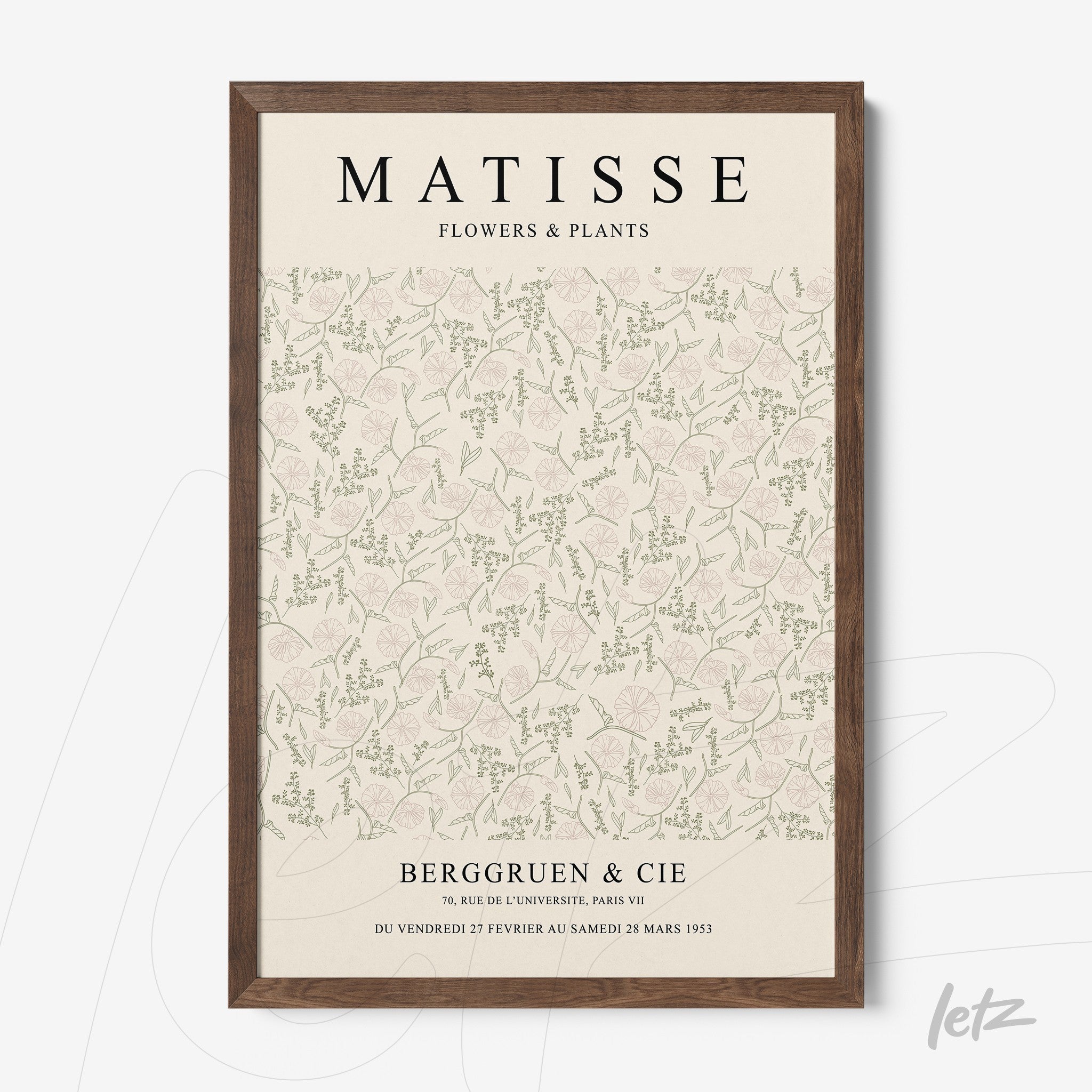 framed wall art featuring floral design on a light background with various green elements and dark wood frame