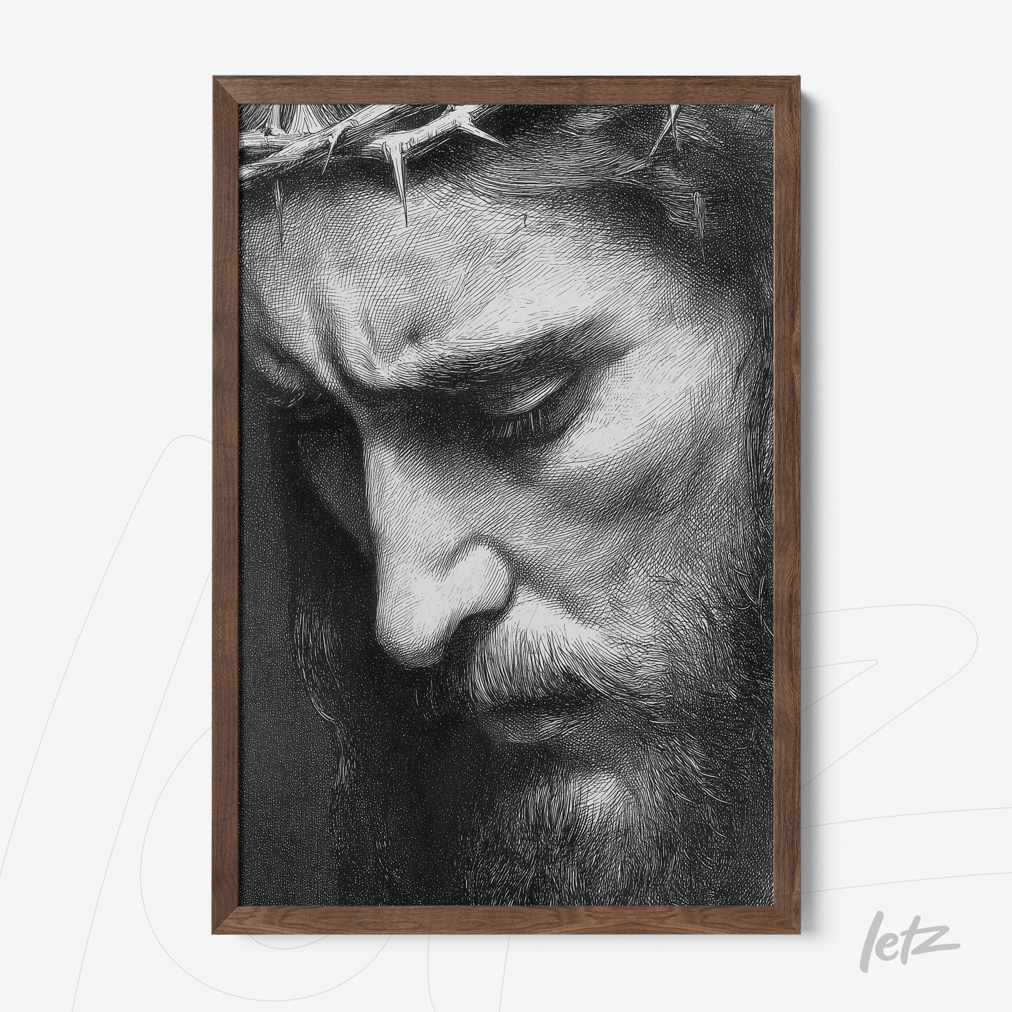 framed wall art featuring a black and white portrait of a bearded man in profile with a contemplative expression