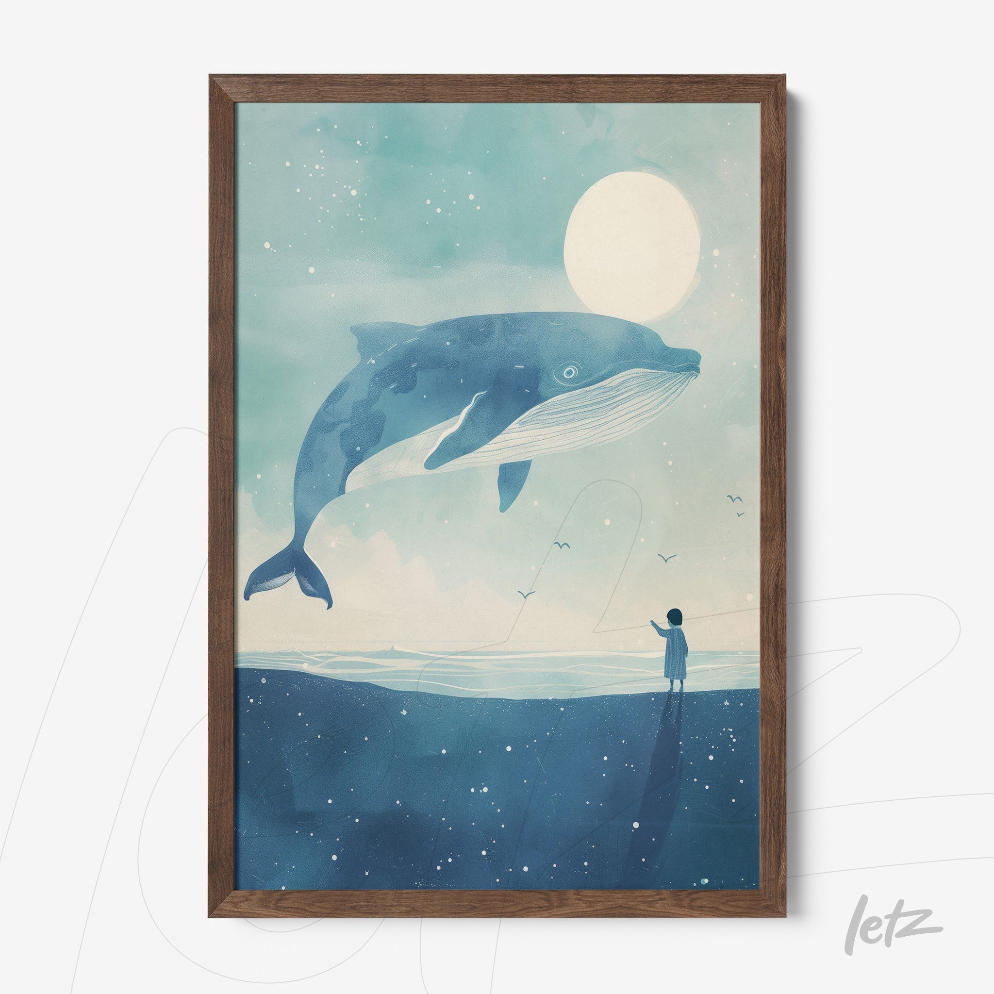 framed artwork featuring a giant blue whale floating above a boy on a beach under moonlight with dark wooden frame