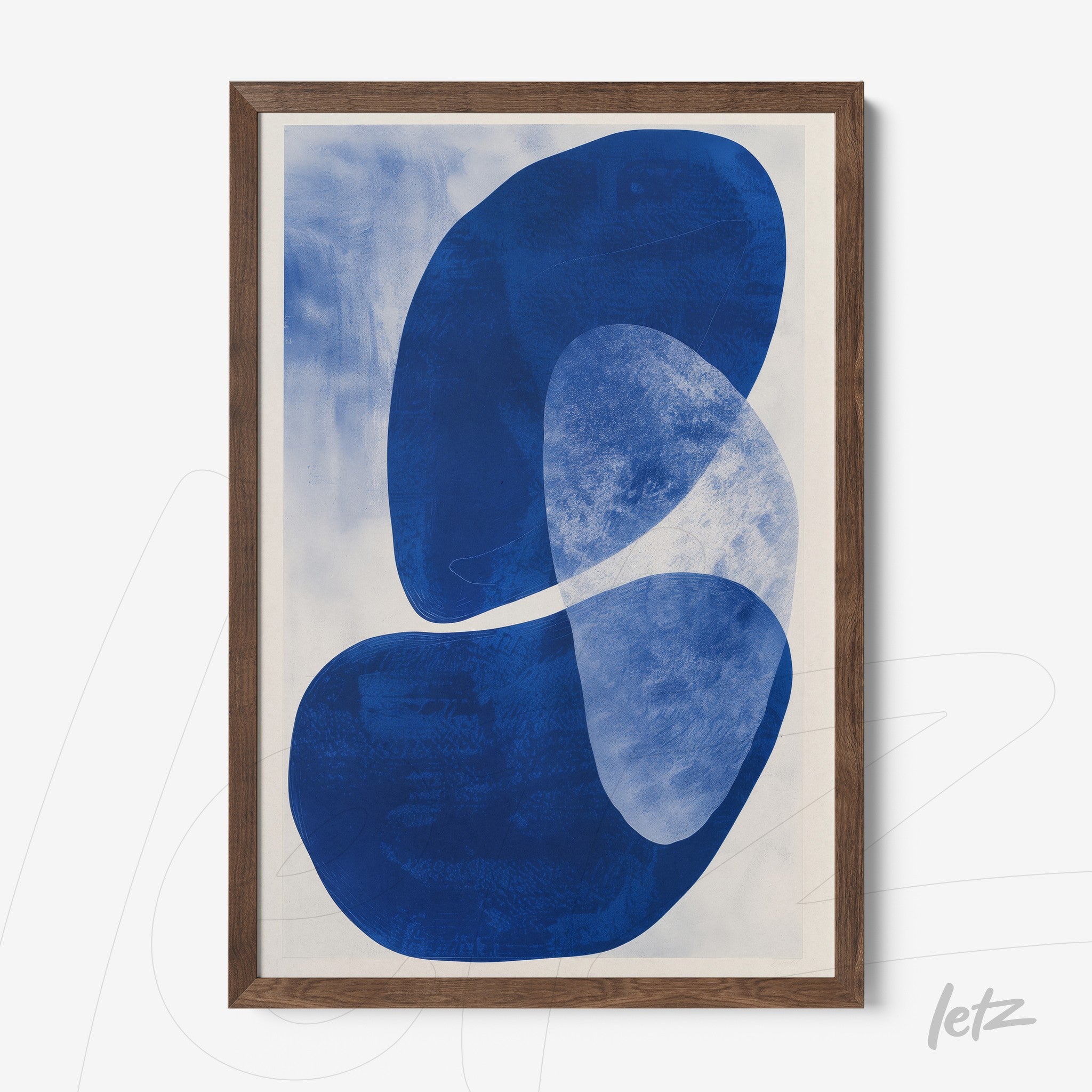 abstract wall art in blue on a light background, framed with a dark wood frame
