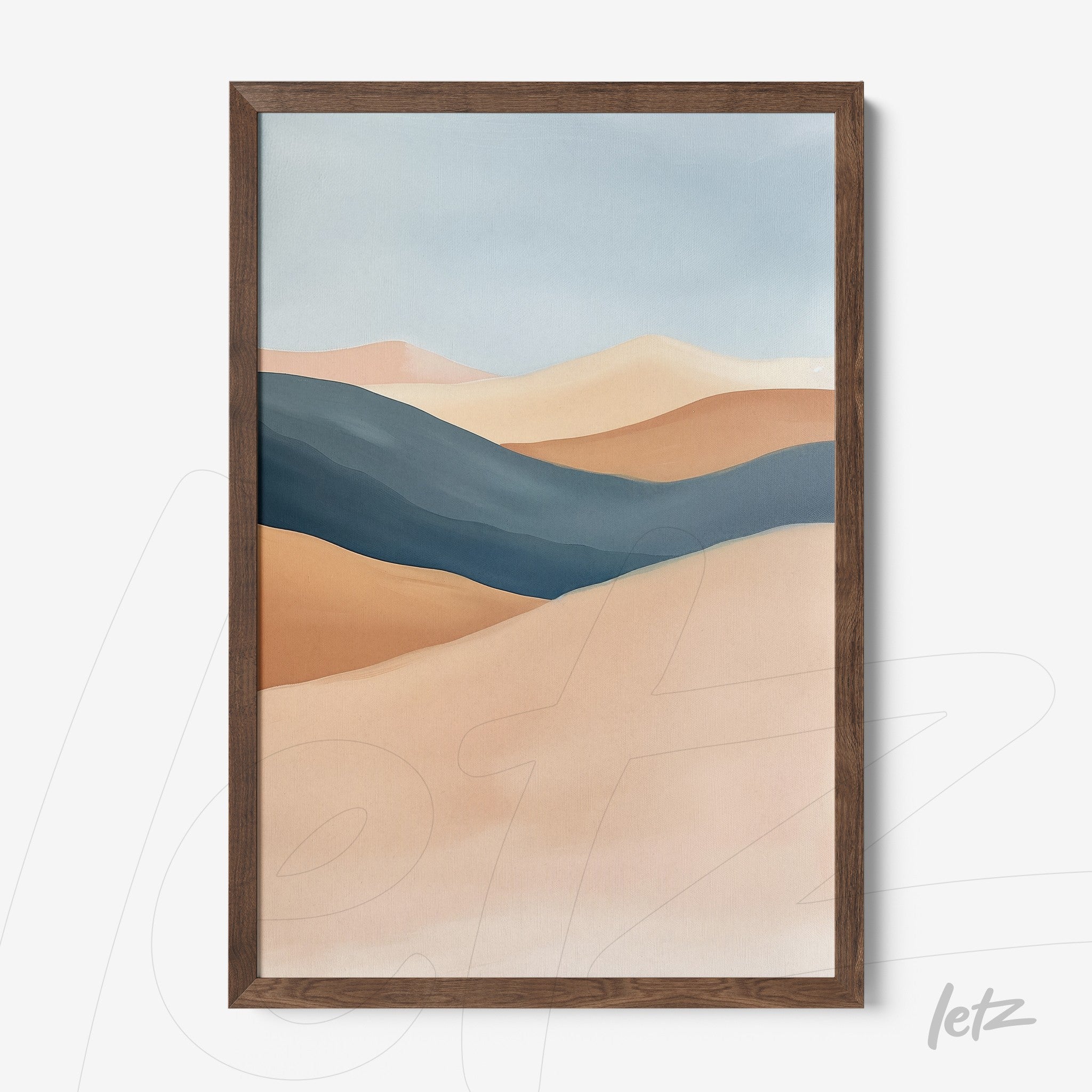 framed abstract wall art in earthy tones and blues with dark wood frame
