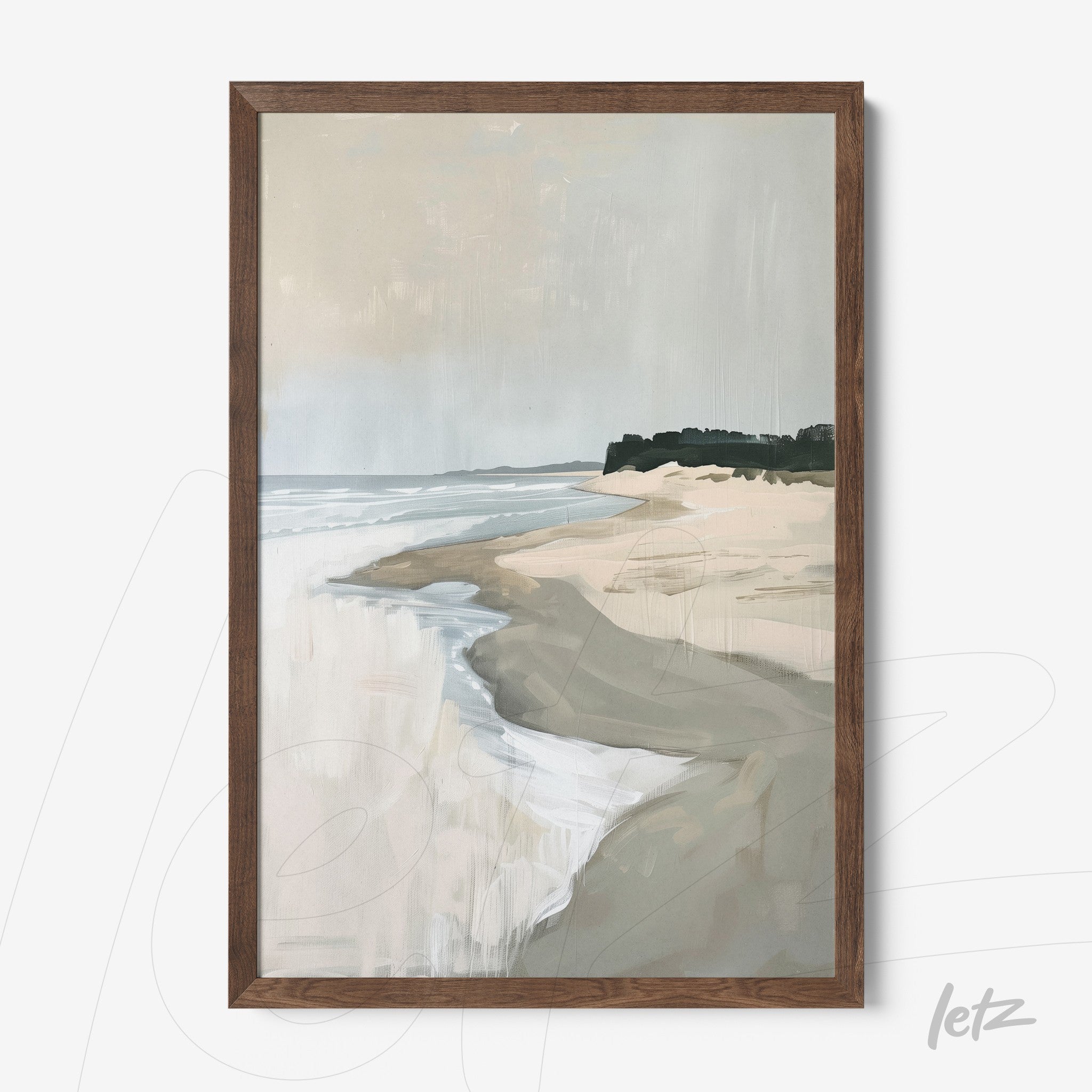 framed wall art featuring a serene beach scene with light sand and greenery in the background