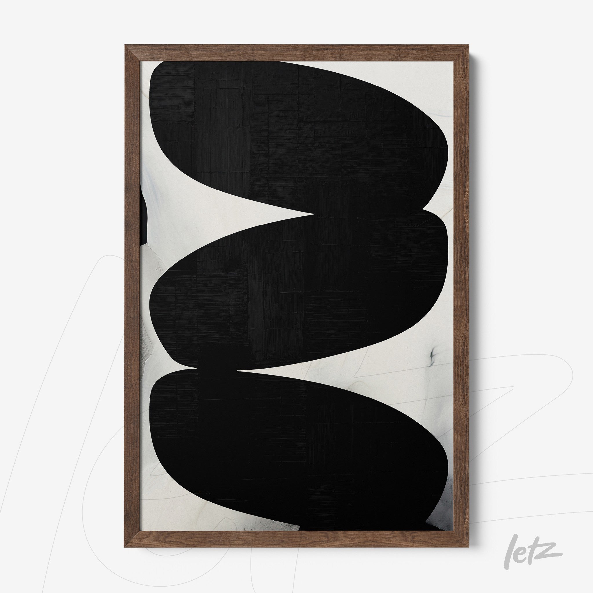 abstract wall art in black and white, framed in a light wood rustic frame