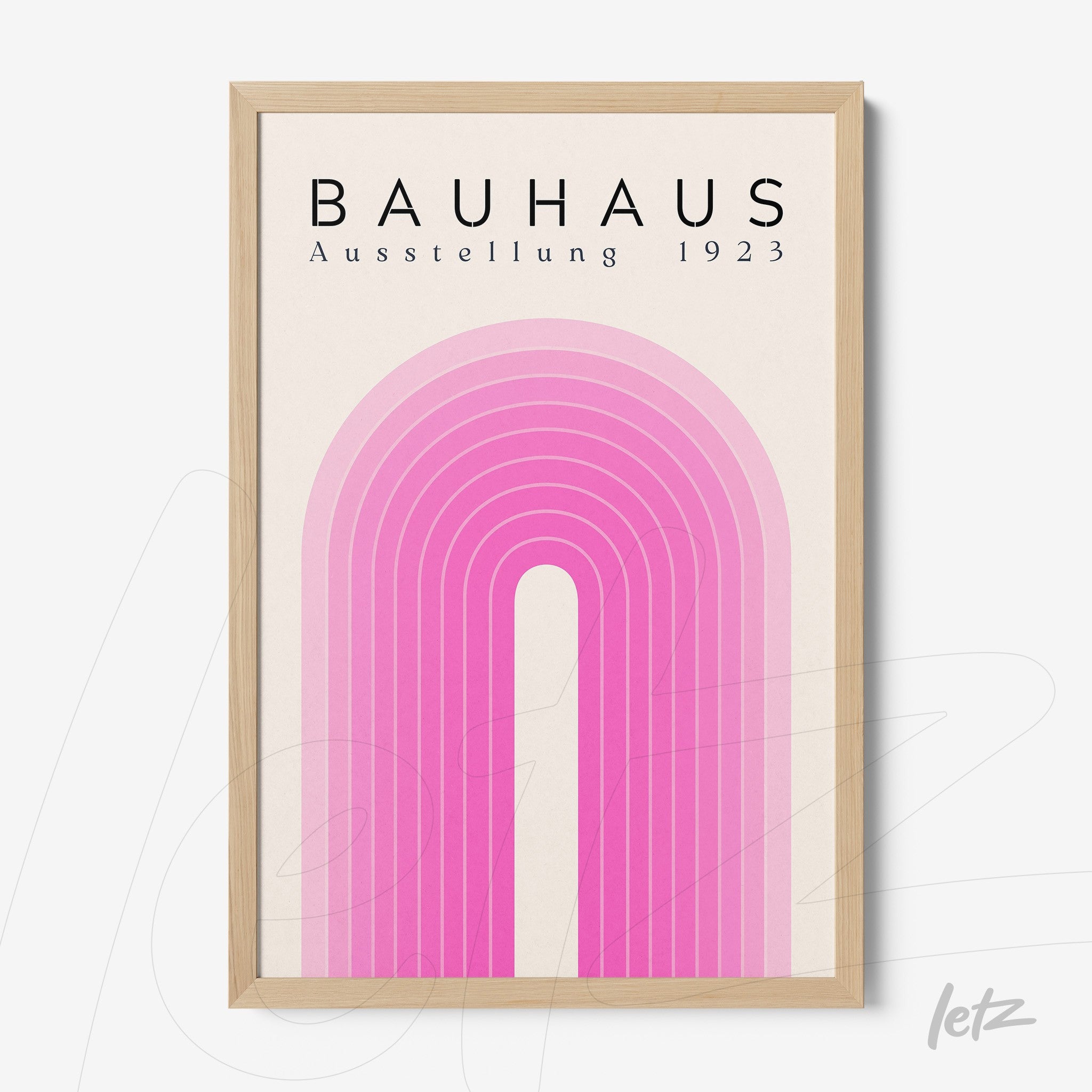 framed poster with pink arch in bauhaus style and light wood frame