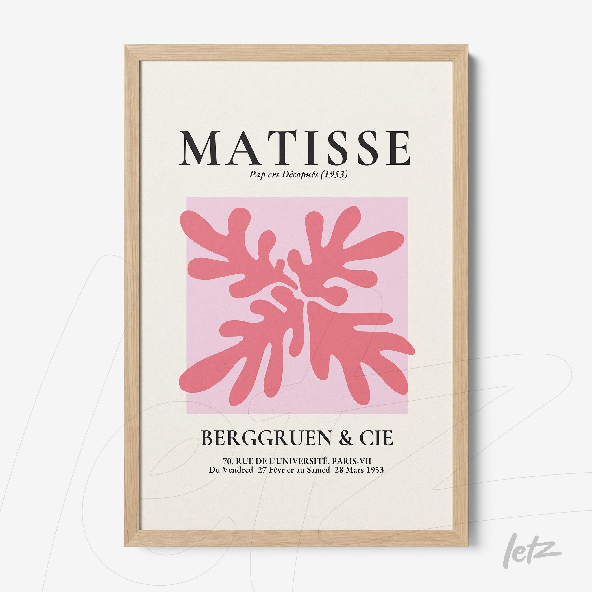 modern art print in the style of Matisse featuring organic shapes in pink on a light pink background with a light wood frame