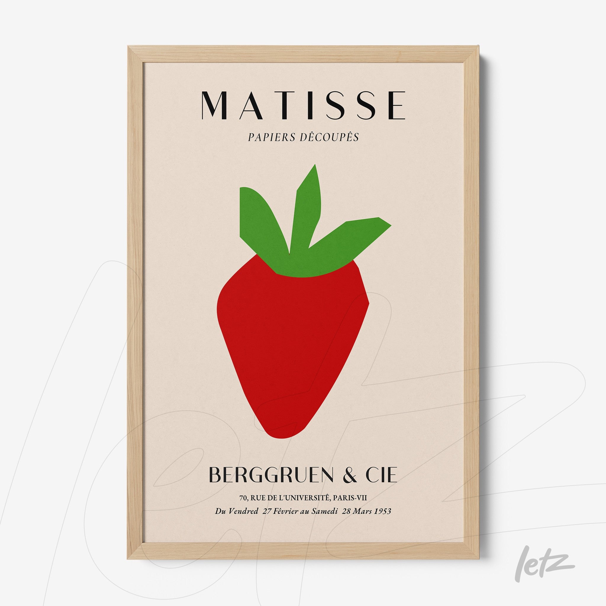 framed wall art featuring a stylized strawberry in primary colors with a light wood frame
