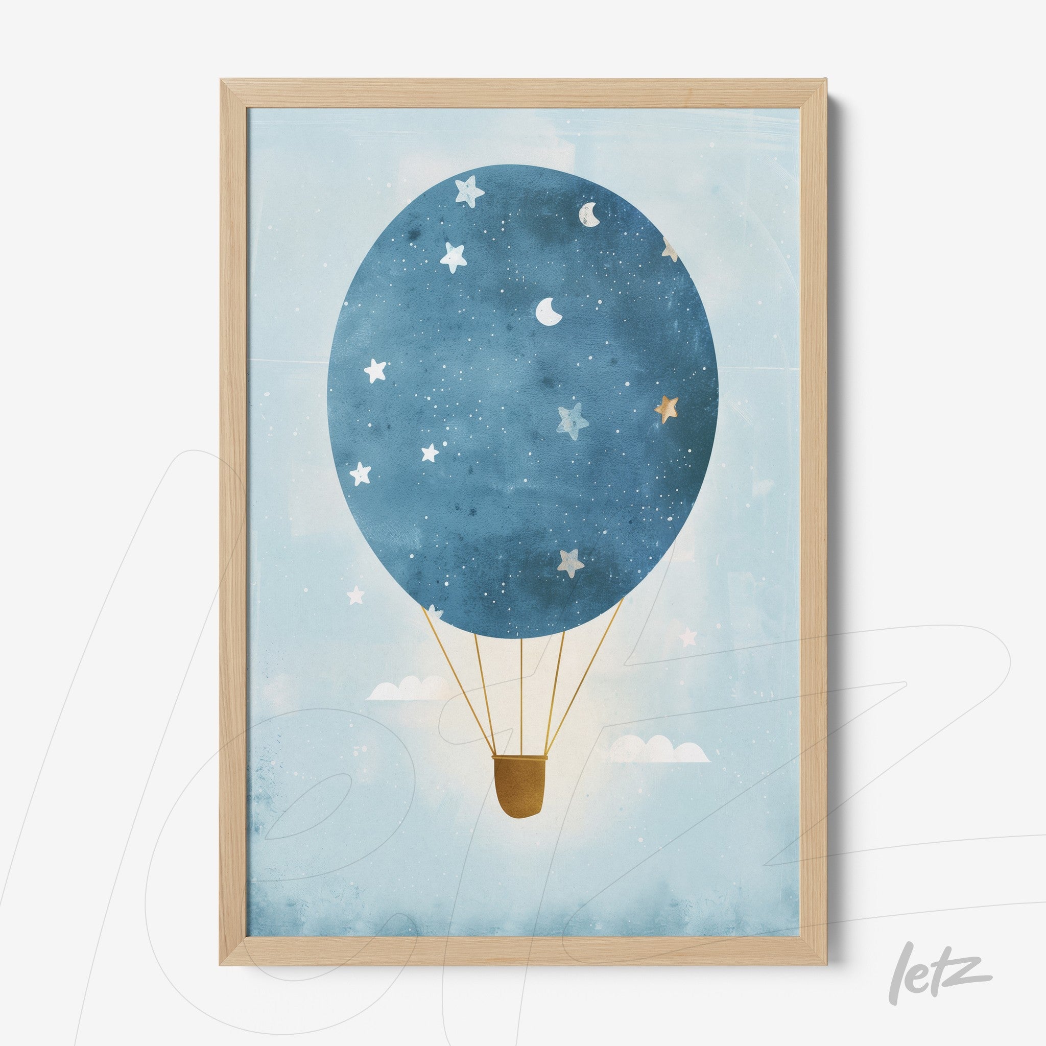 framed wall art featuring a blue hot air balloon with stars against a light background, with a light wood frame