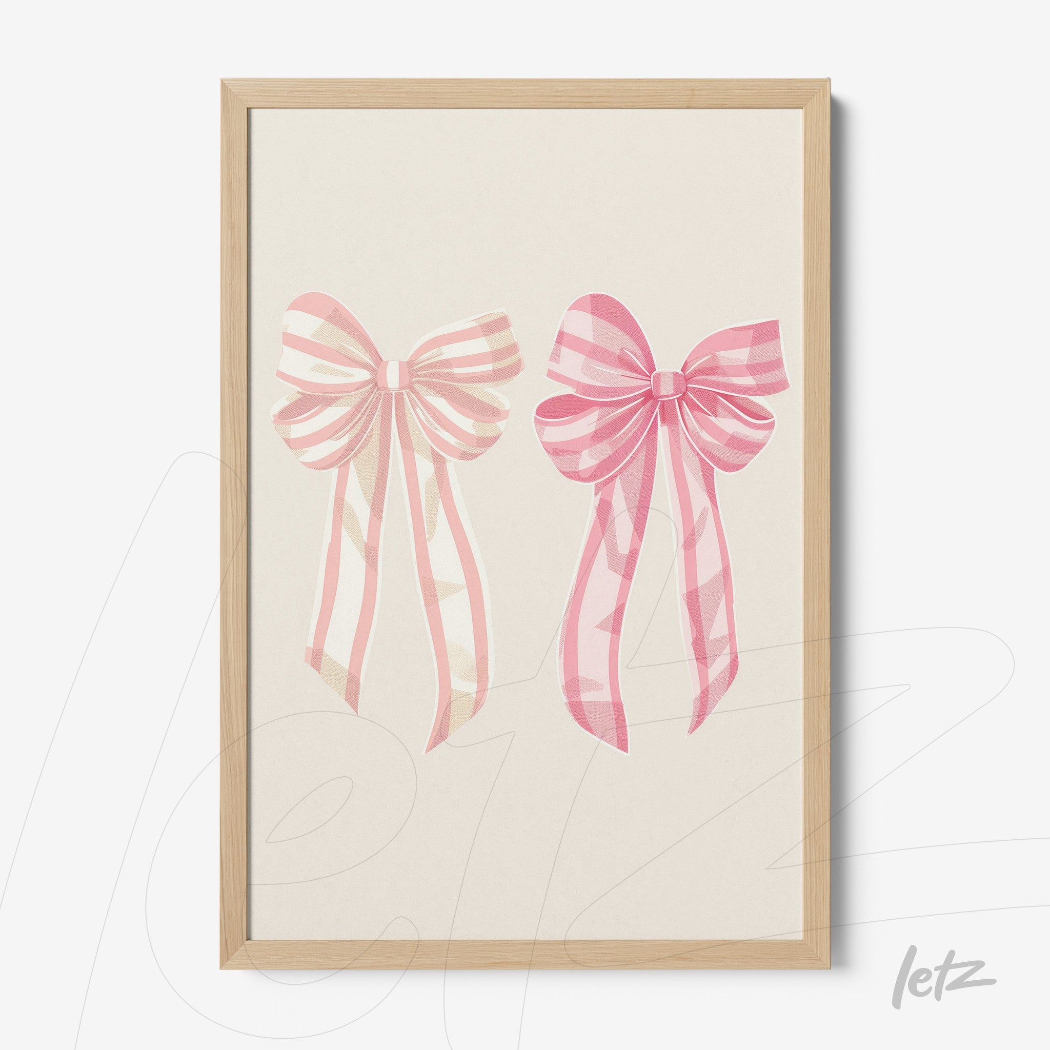 framed wall art featuring illustrations of two pink bows with diagonal stripes