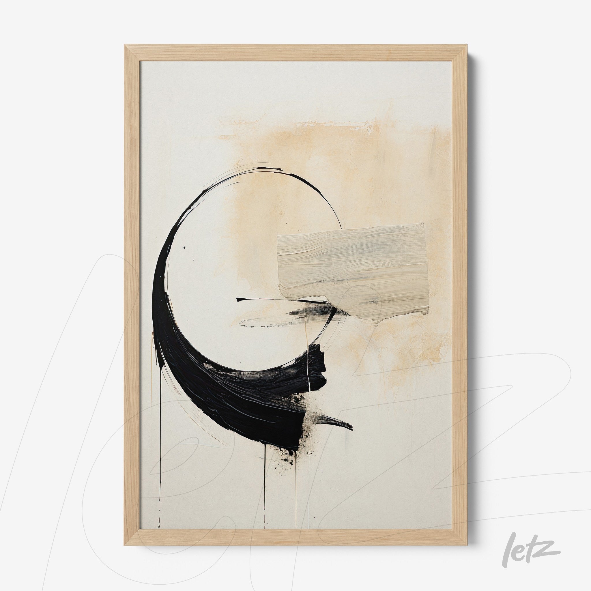 framed abstract art featuring neutral tones with a circular shape, black brush strokes, and a creamy stripe in a light wood frame