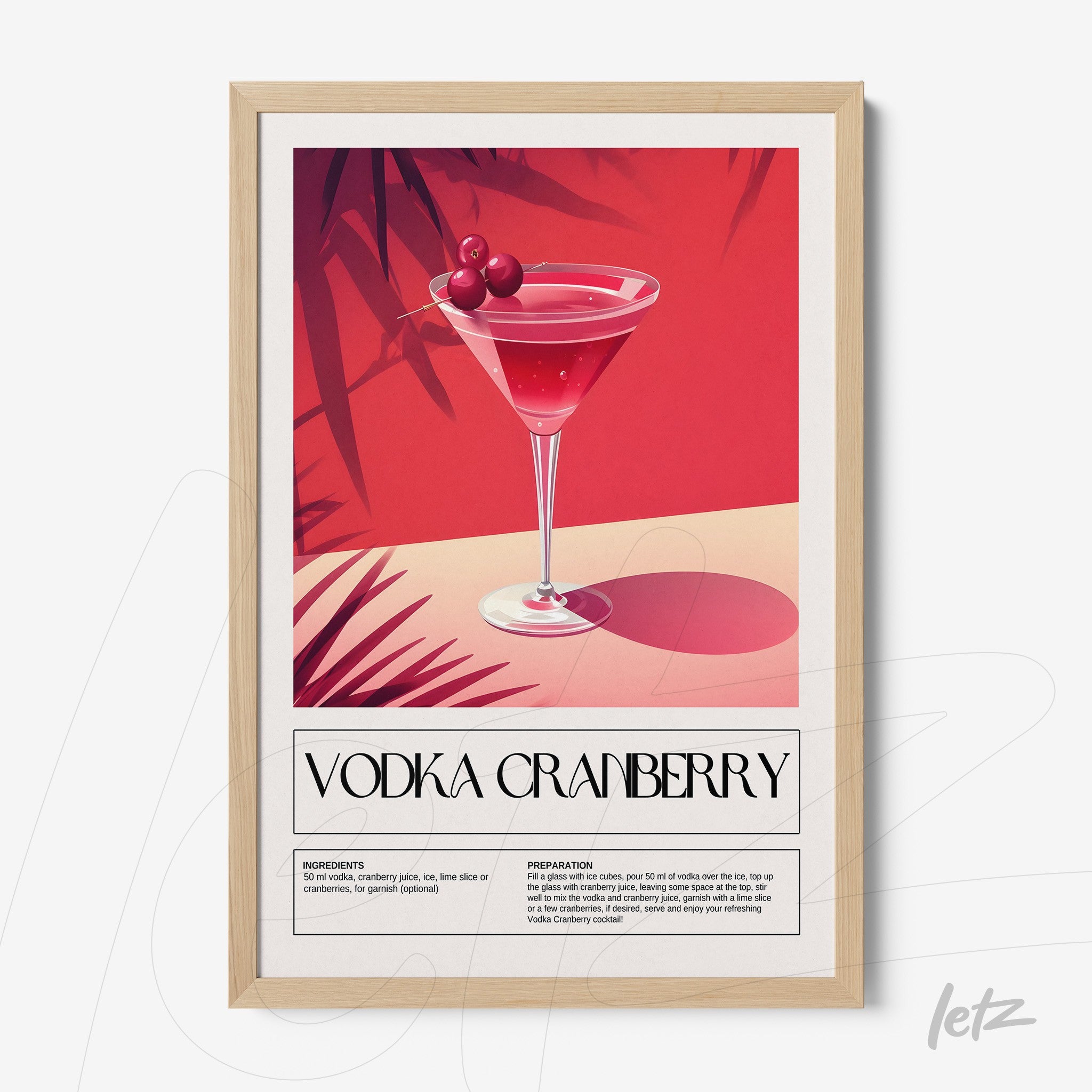 framed art print of a vodka cranberry cocktail in a natural frame with a vibrant red background