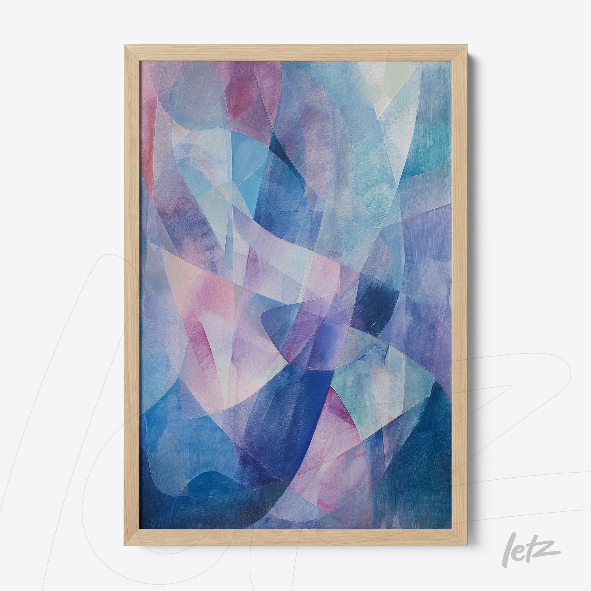 framed abstract art in shades of blue and pink with light wood frame