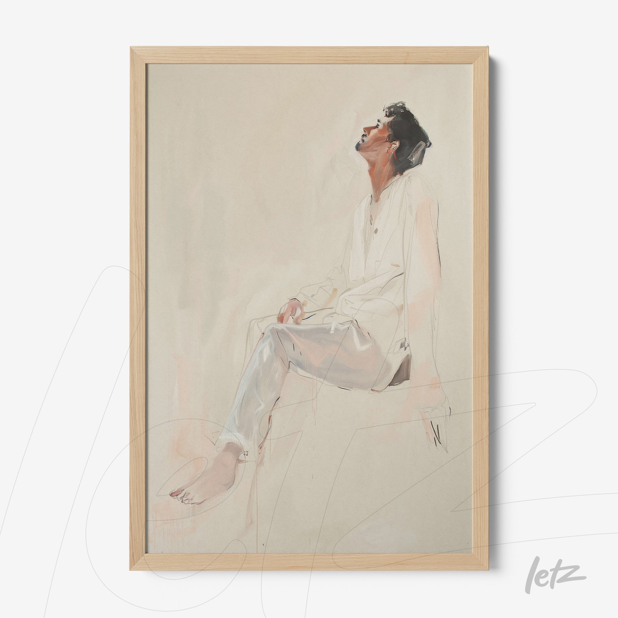 framed artwork featuring an artistic portrait of a man sitting in a contemplative pose with light wood frame