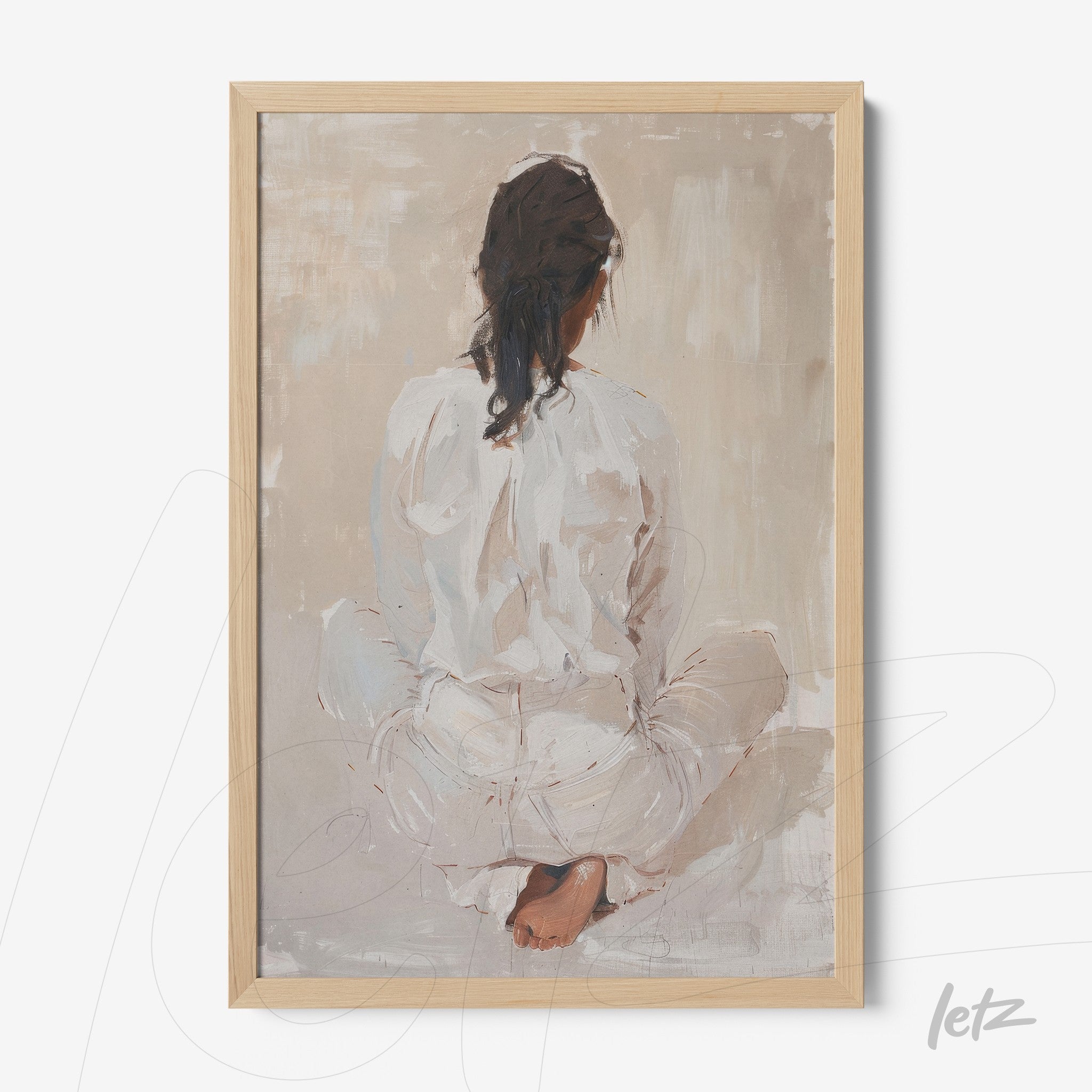 modern artwork of a woman sitting with her back to the viewer in a light wood frame