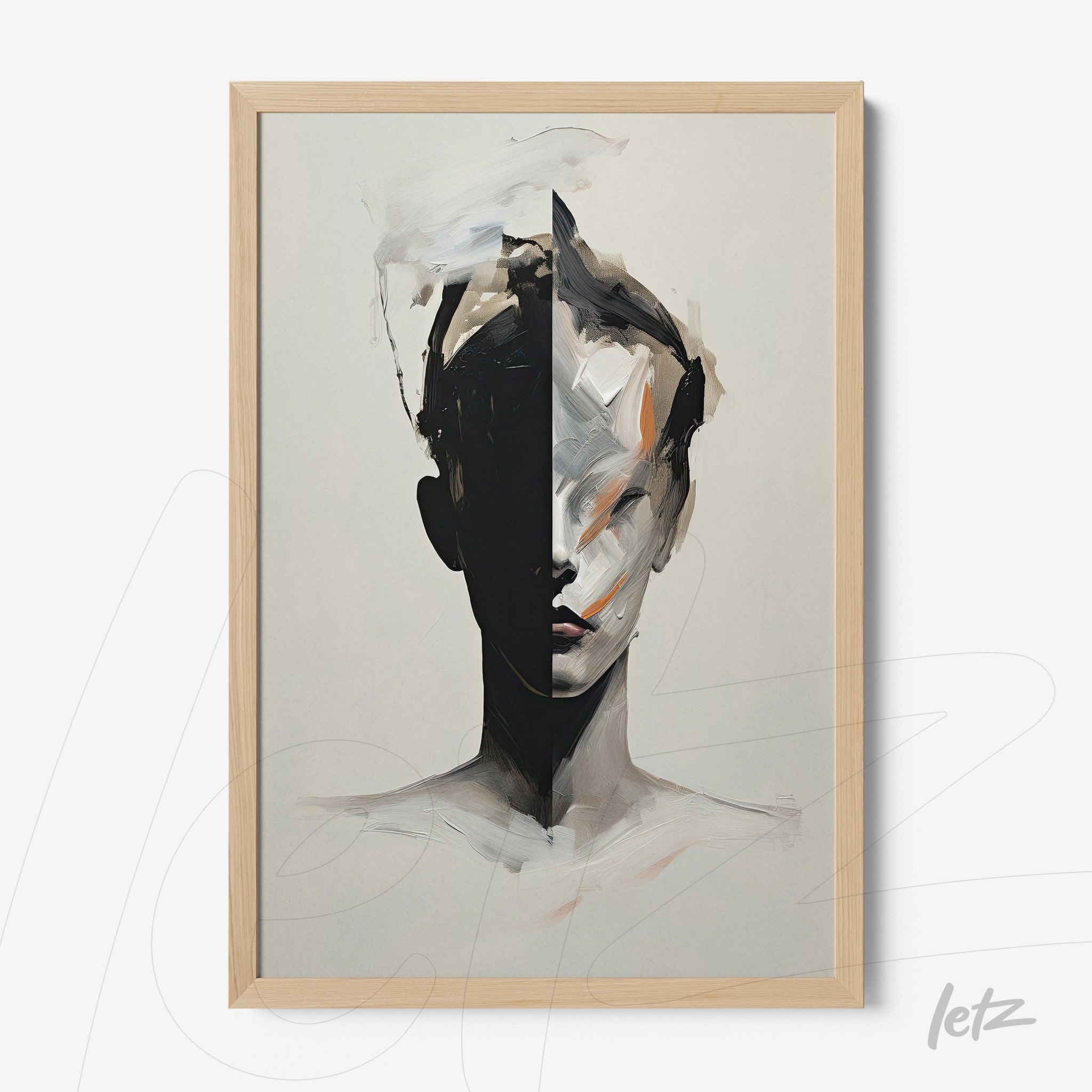 abstract art print depicting a human face divided in half with dark and light tones, featuring a light wood frame